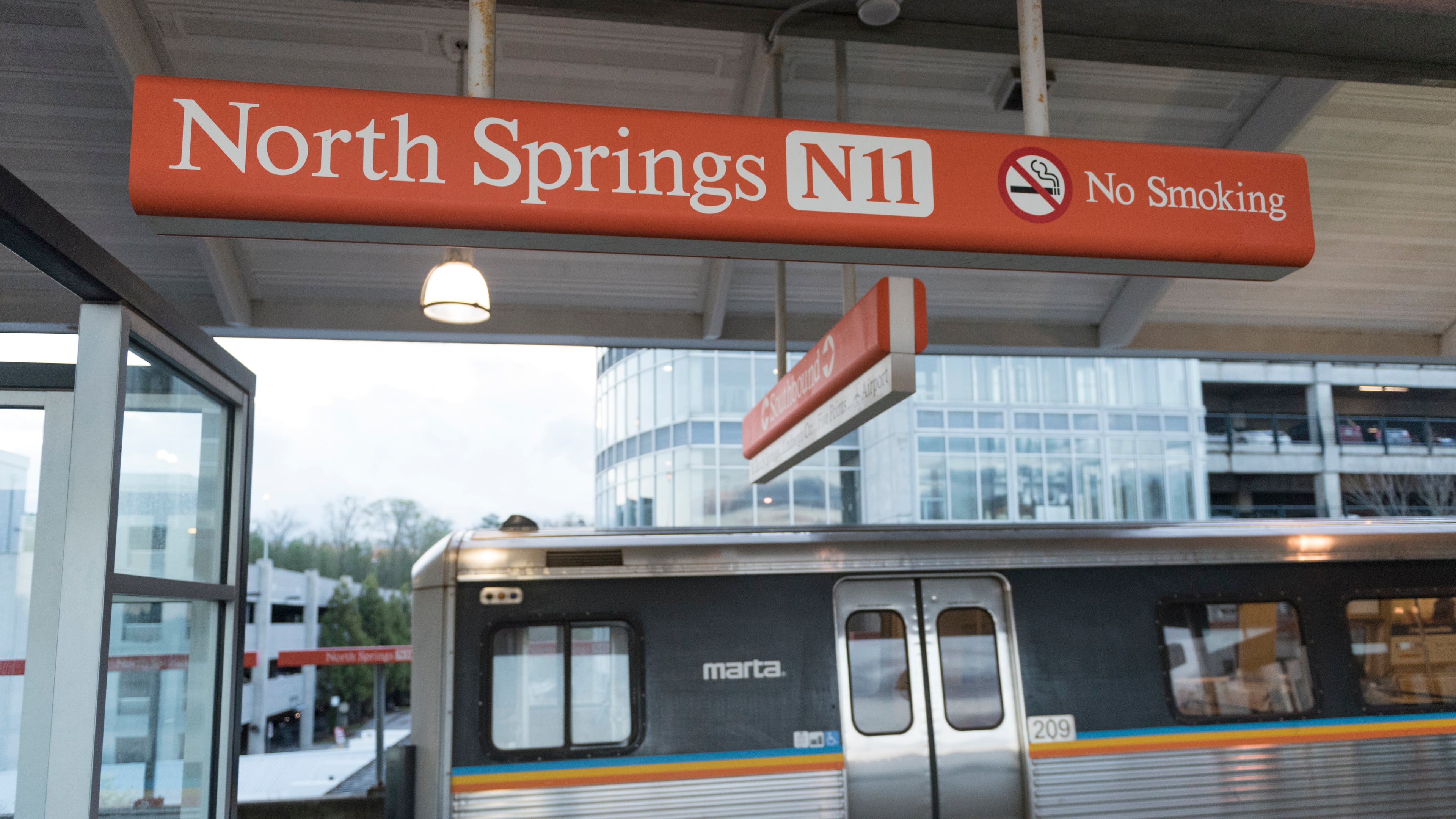 A red line train leaves the North Springs MARTA Station in Atlanta, Georgia, where parking is a major issue after the I-85 collapse. (DAVID BARNES / DAVID.BARNES@AJC.COM)