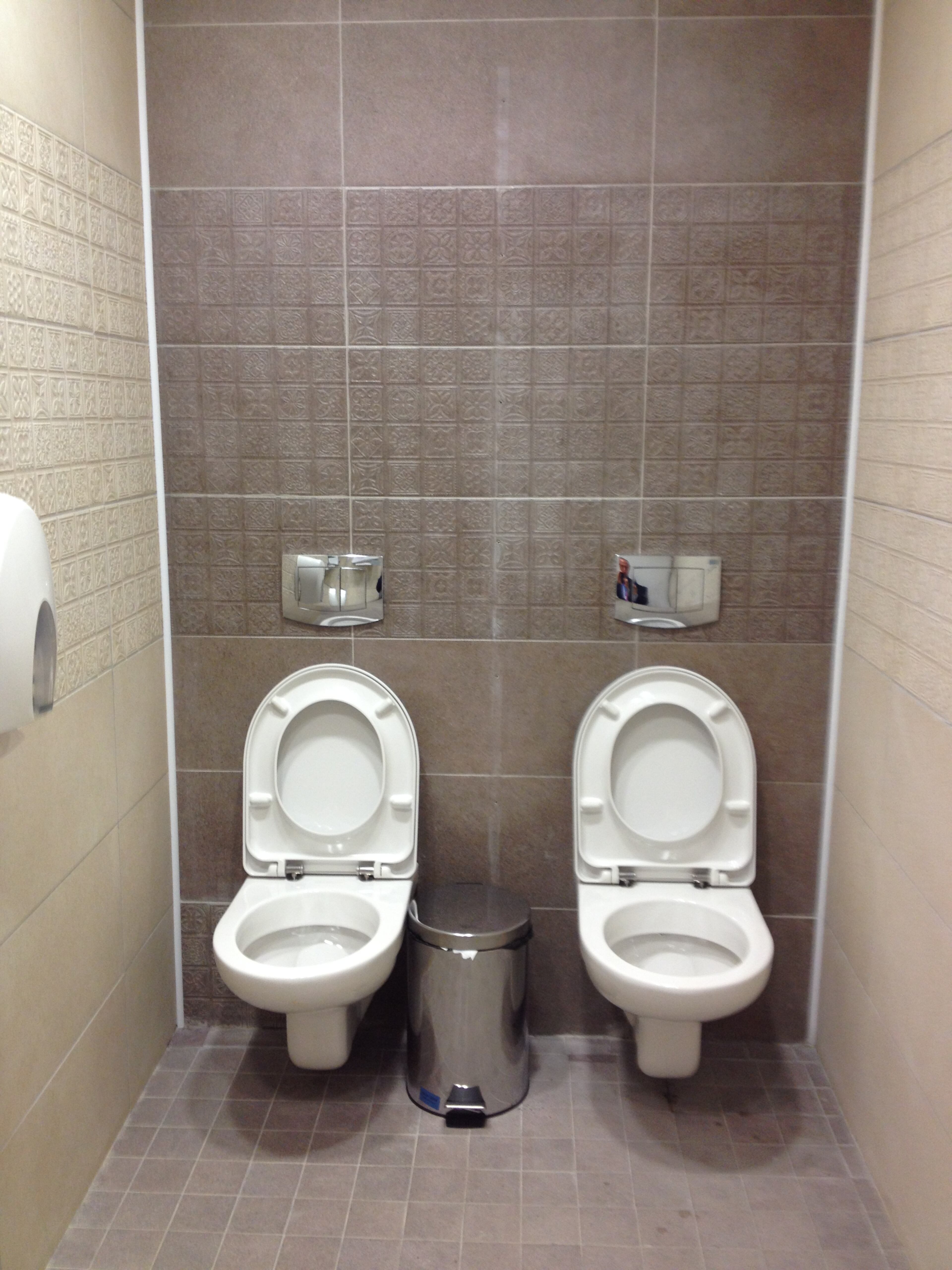 When BBC reporter Steve Rosenberg went to use the bathroom at the cross-country skiing and biathlon center for next month's Winter Olympics in Sochi, he found two toilets but only one stall. His tweeted picture instantly became a national joke. READ MORE BY CLICKING HERE.