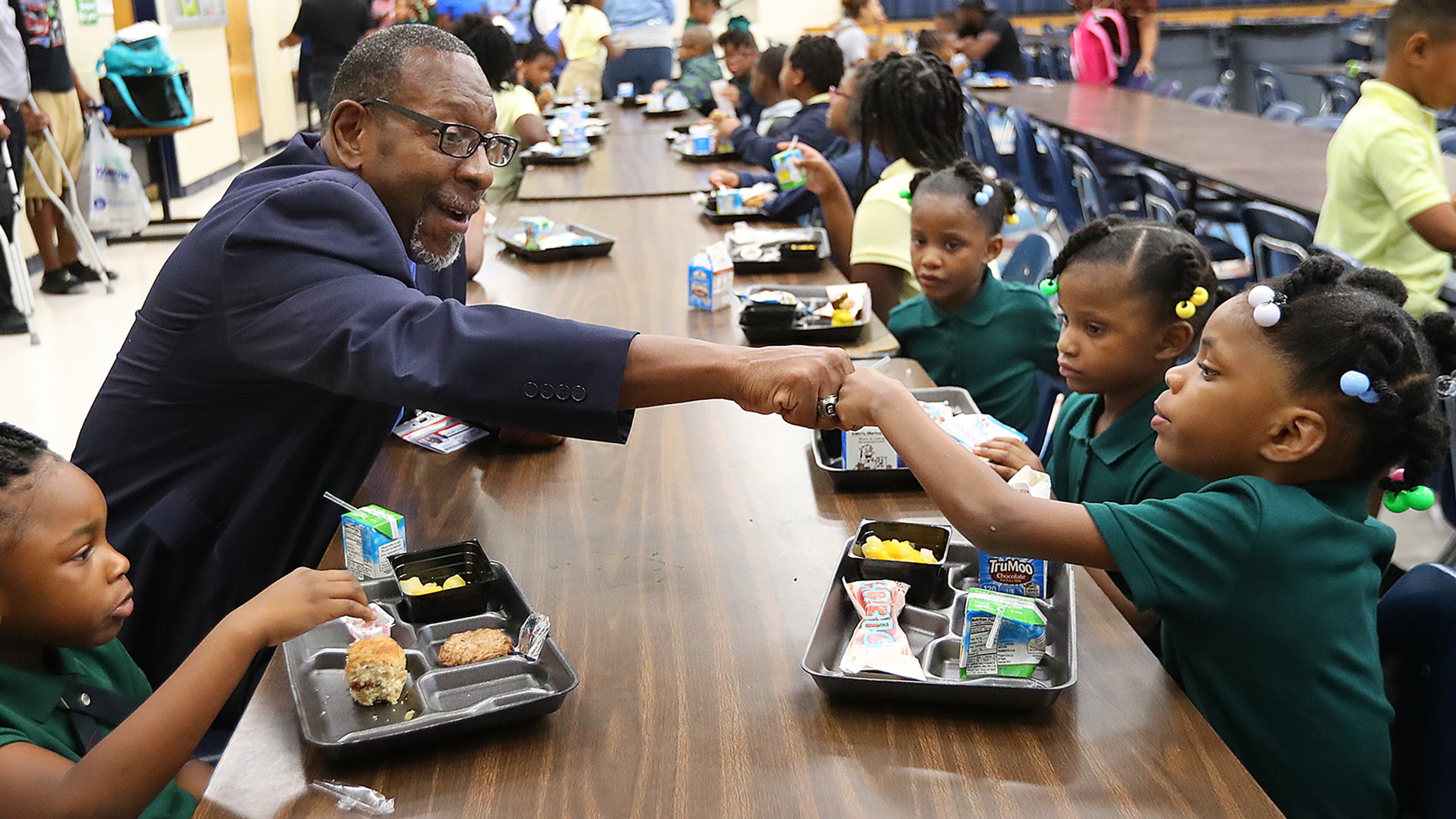 August 7, 2017 Lithonia; DeKalb Schools Superintendent Dr. R. Stephen Green gives 6-year-old kindergarten student Lanyah Bailey a fist bump during the first day of school at Edward L Bouie Elementary School on Monday, August 7, 2017, in Lithonia. Curtis Compton/ccompton@ajc.com