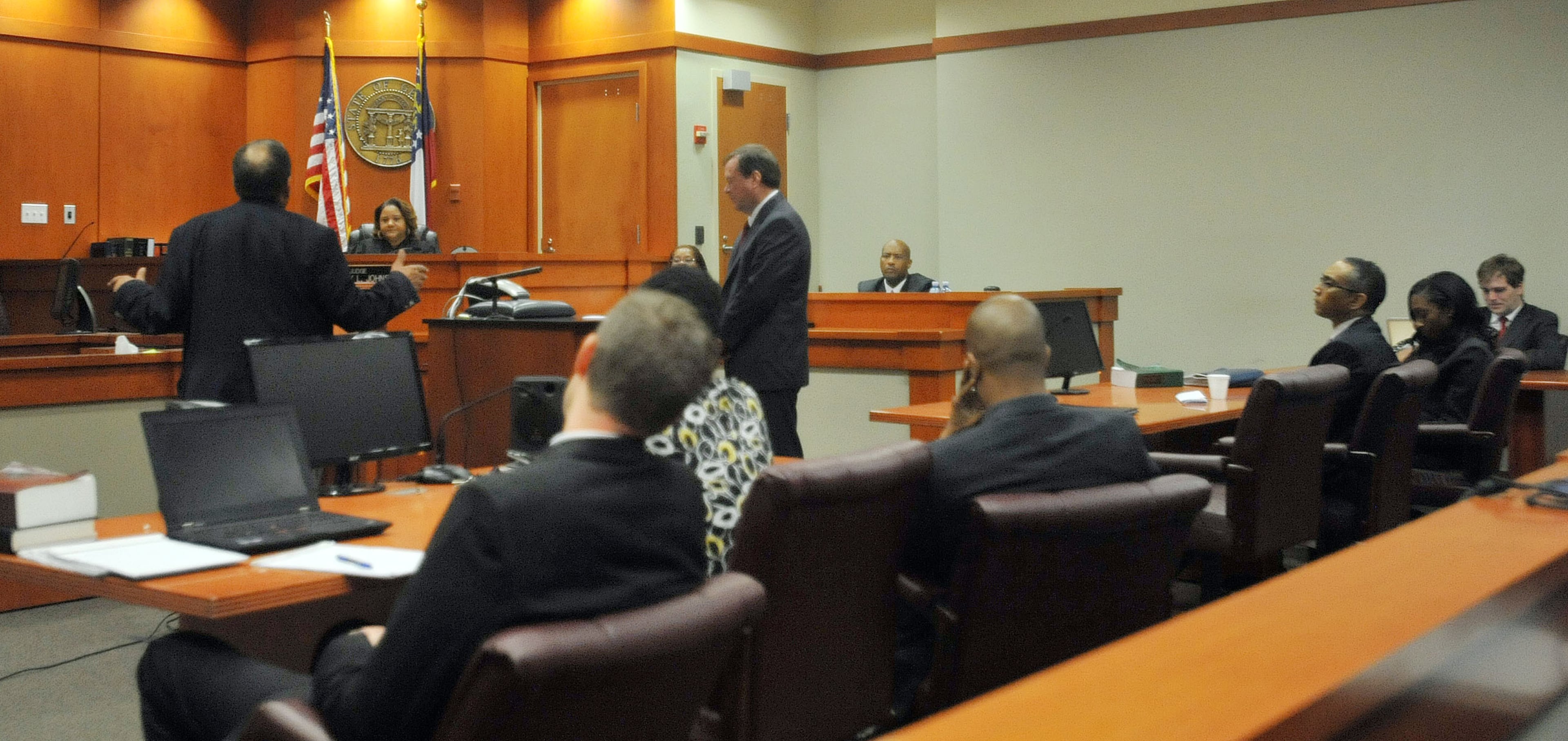 Former Ambassador Andrew Young speaks on behalf of embattled DeKalb County CEO Burrell Ellis Wednesday. Ellis was sentenced to 5 years to serve 18 months in prison Wednesday July 8, 2015. Ellis was found guilty of attempted extortion and perjury a week ago in his retrial before Superior Court Judge Courtney Johnson. KENT D. JOHNSON /KDJOHNSON@AJC.COM