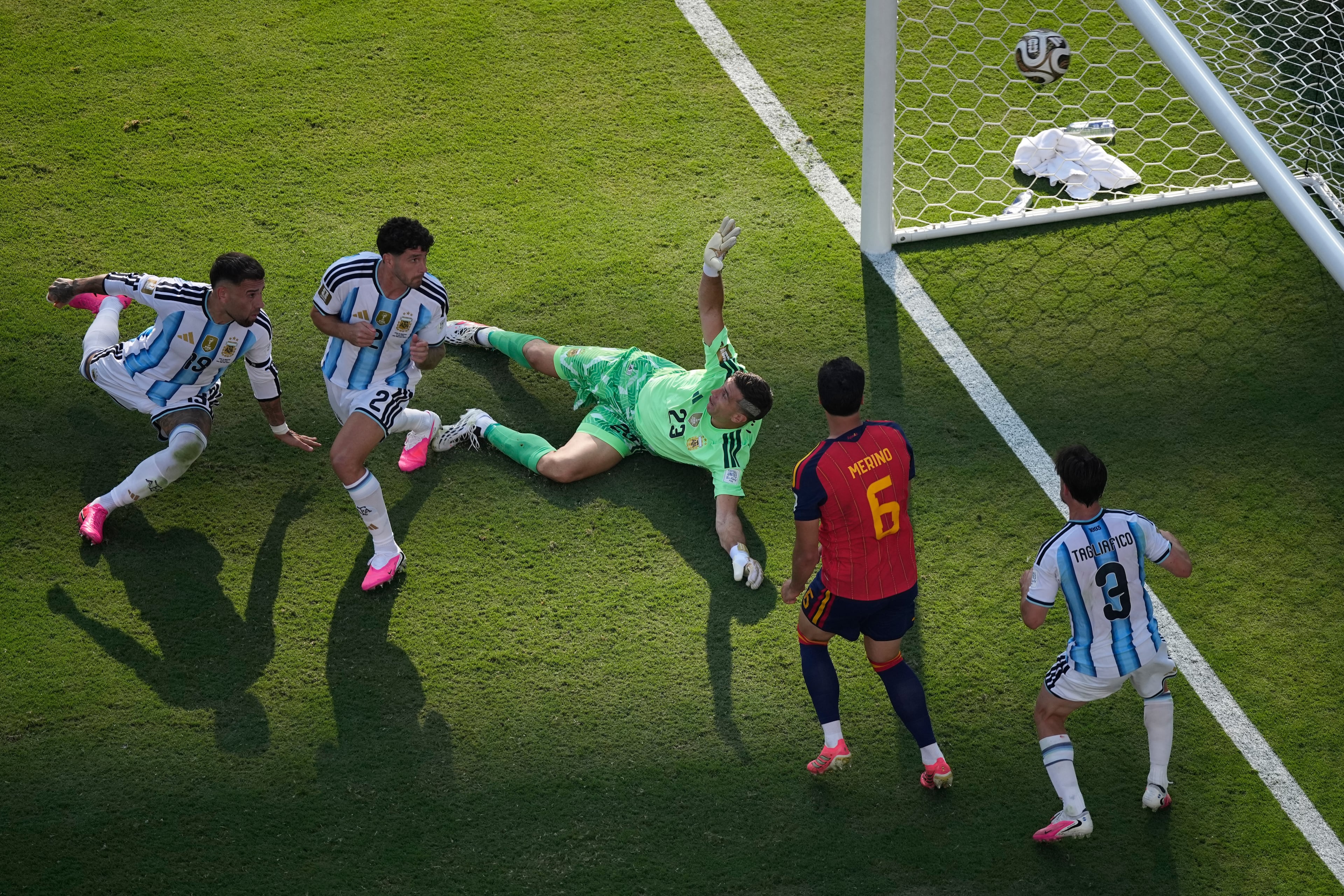 Argentina goalkeeper Emiliano Martinez (center) fails to save a shot by Spain's Ferran Torres (second from right) who scored their opening goal during the World Cup final soccer match between Spain and Argentina in East Rutherford, N.J., near New York, Sunday, July 19, 2026. (Matt Slocum/AP)