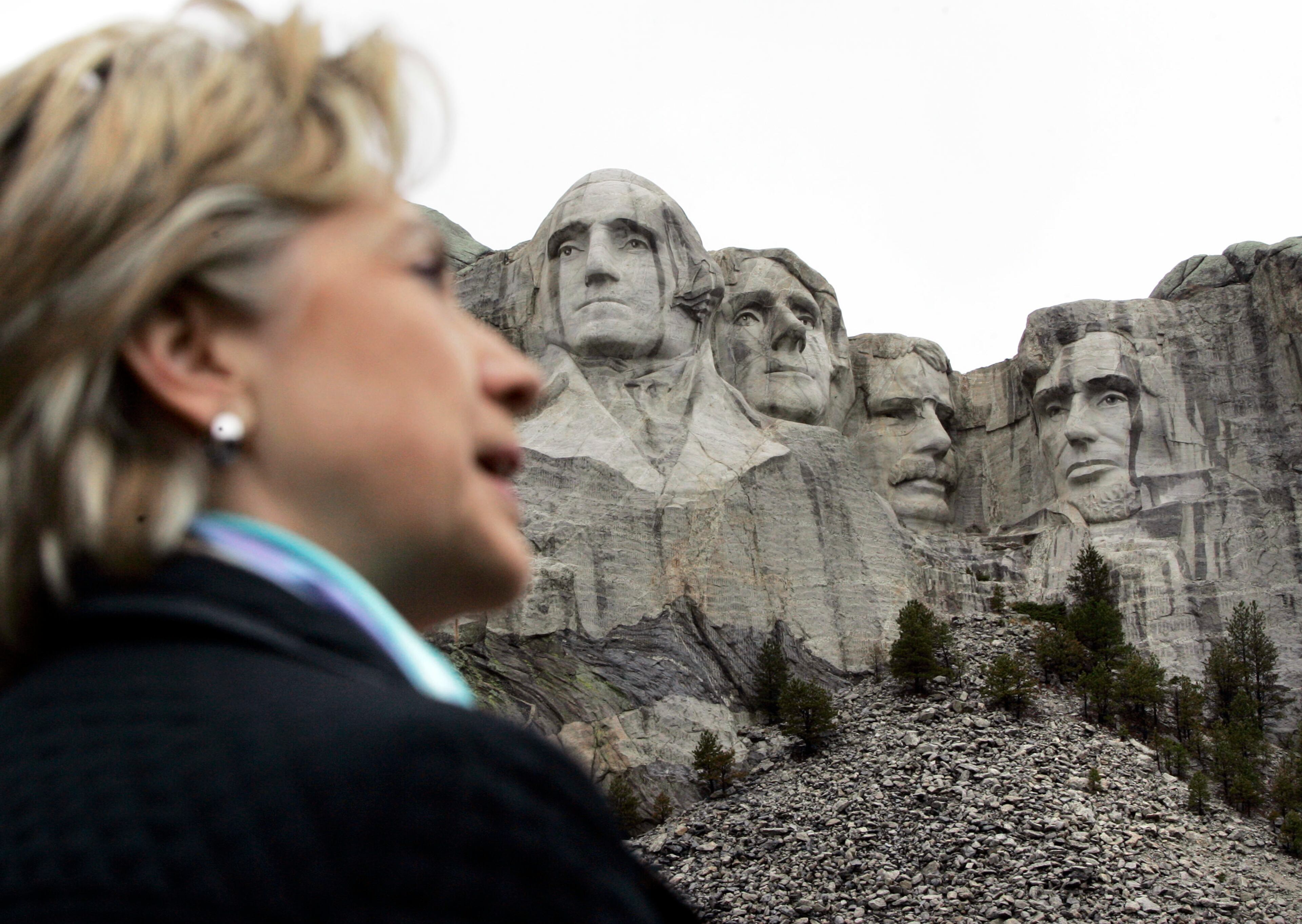 In this Wednesday, May 28, 2008 file photo, Democratic presidential hopeful Sen. Hillary Clinton, D-N.Y., visits the presidential sculptures at Mount Rushmore near Keystone, S.D., as she campaigns in South Dakota. (AP Photo/Elise Amendola)