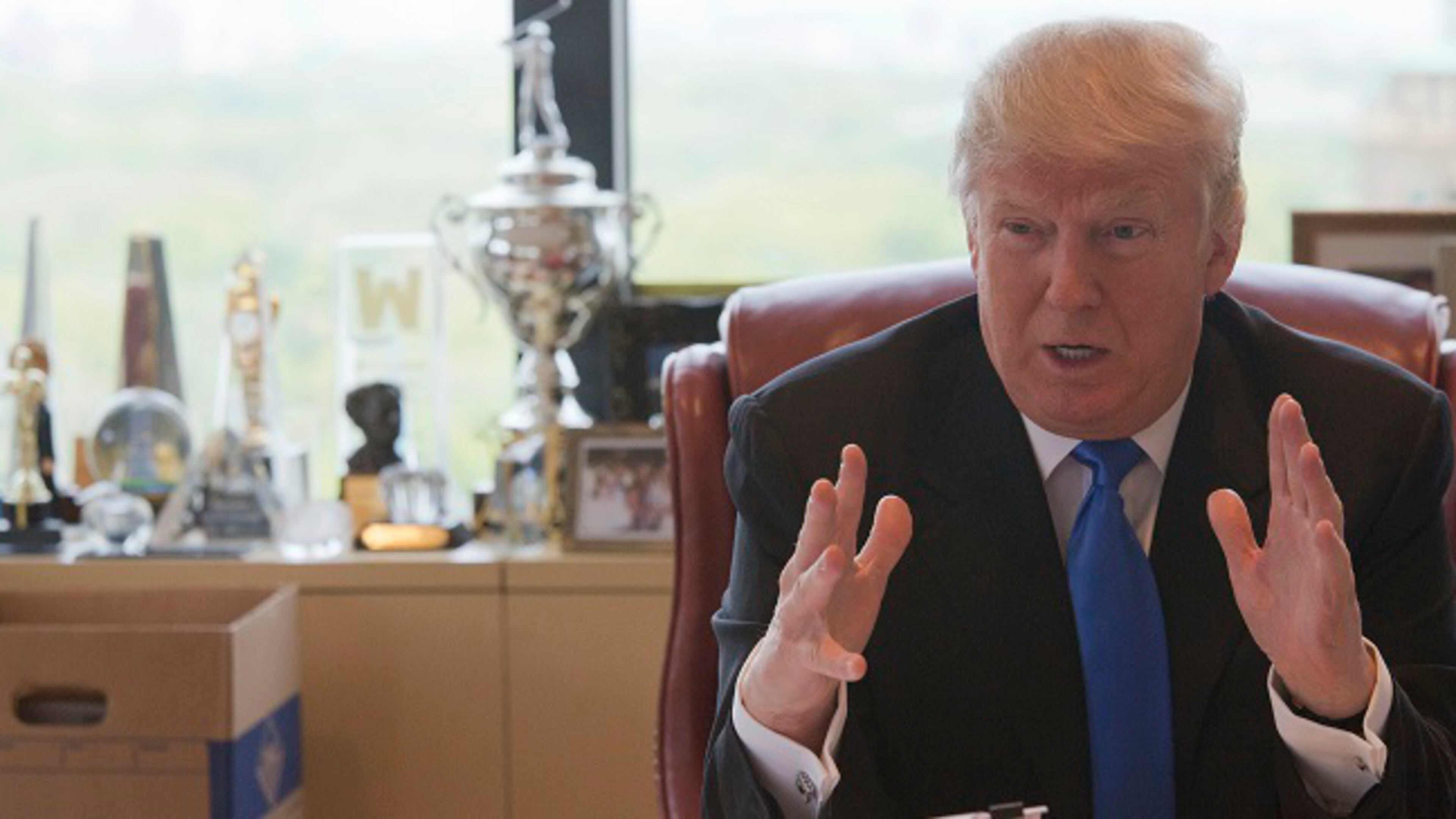 Republican presidential candidate Donald Trump gestures as he speaks during an interview with The Associated Press in his office at Trump Tower, Tuesday, May 10, 2016, in New York. (AP Photo/Mary Altaffer)