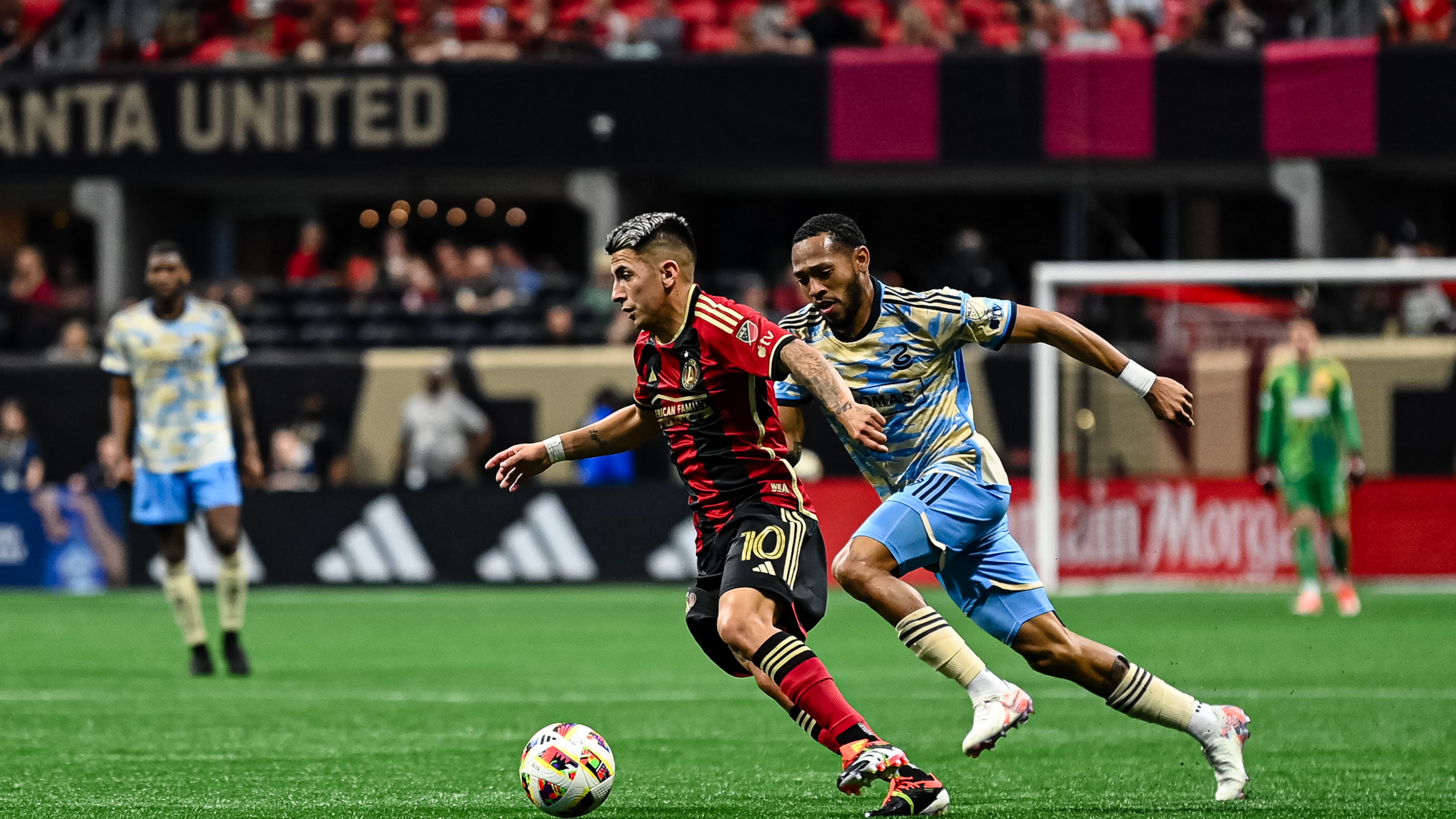 Atlanta United midfielder Thiago Almada #10 dribbles the ball during the match against Philadelphia Union at Mercedes-Benz Stadium in Atlanta, GA on Sunday April 14, 2024. (Photo by Madelaina Polk/Atlanta United)