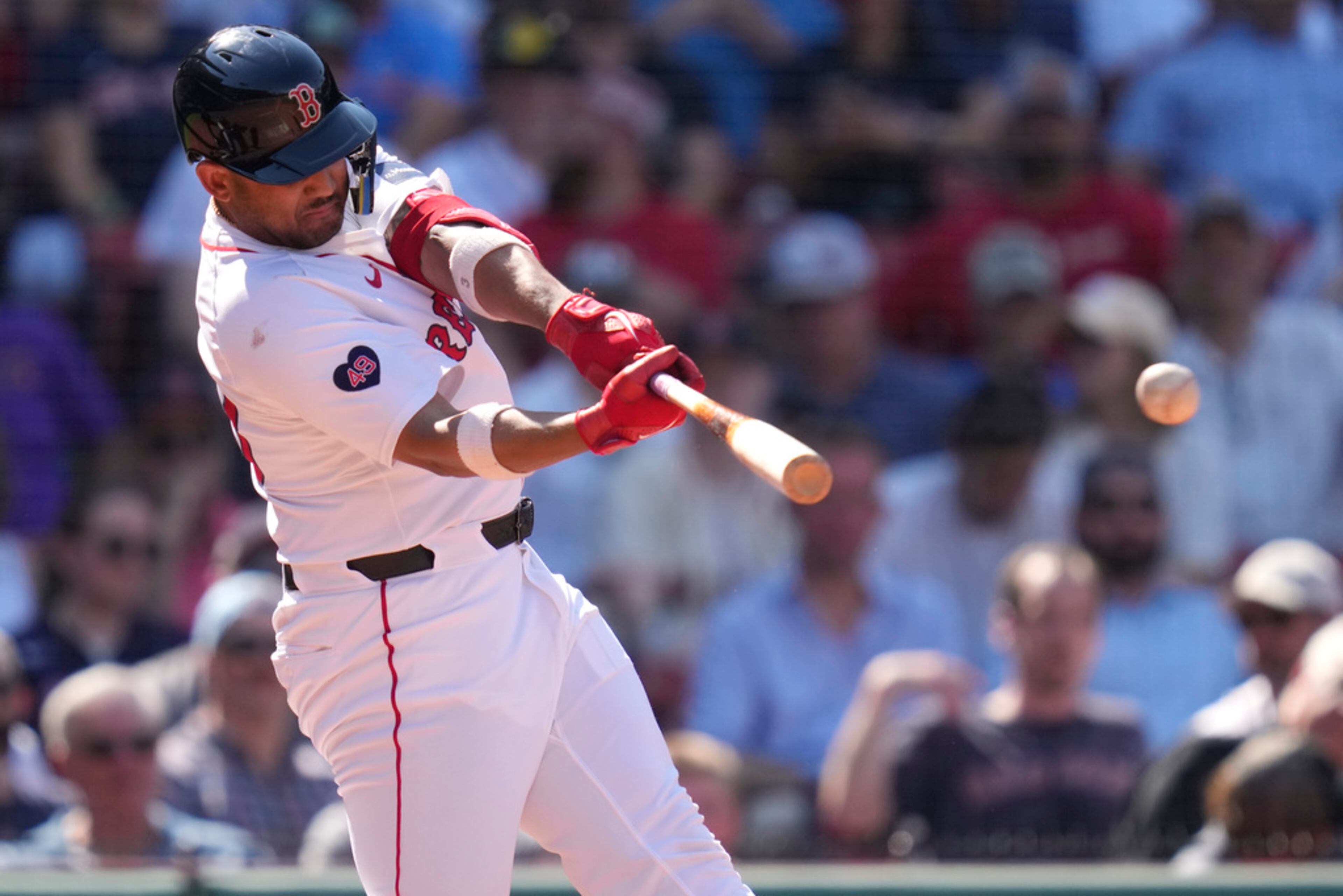 Boston Red Sox's Jamie Westbrook connects for a single, his first Major League Baseball hit, during the eighth inning of a baseball game against the Atlanta Braves, Wednesday, June 5, 2024, at Fenway Park in Boston. Westbrook, 28, has played in the minor leagues over the last 11 seasons. (AP Photo/Charles Krupa)