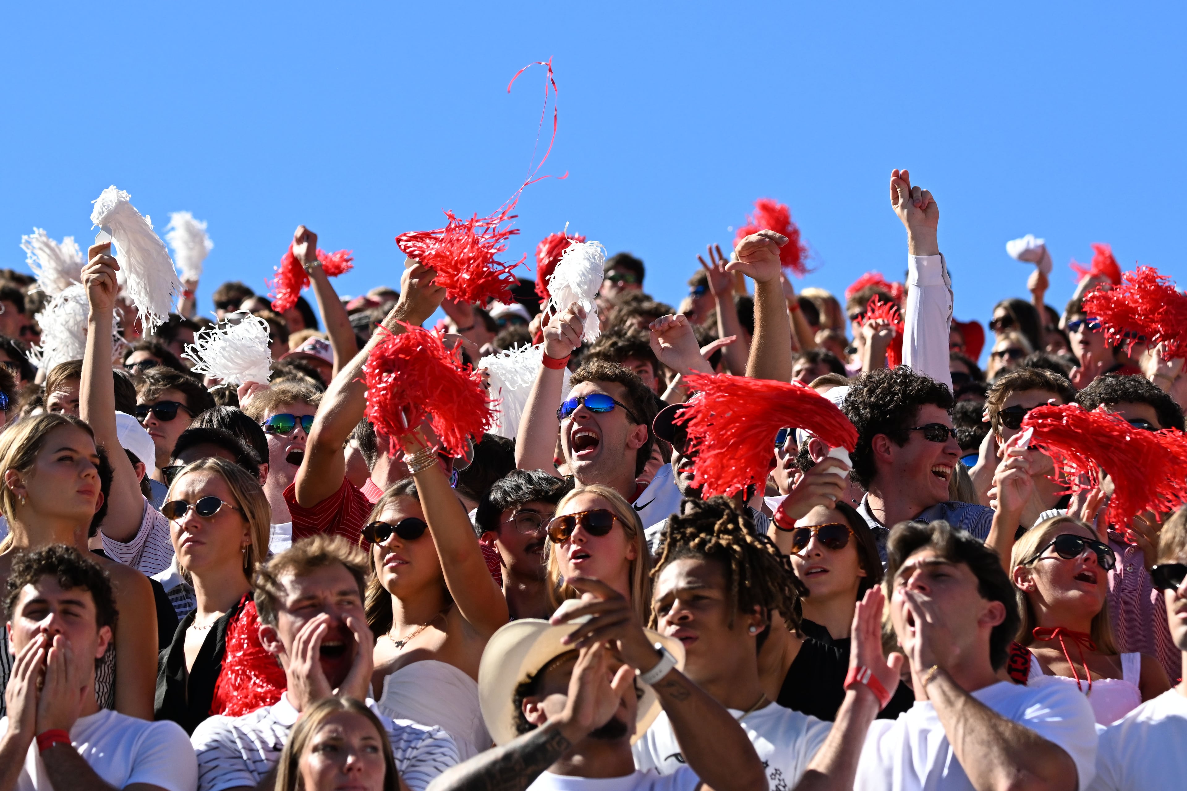 Georgia fans cheer during the first half of an NCAA football game against Oklahoma at Sanford Stadium on Saturday, Sept. 26, 2026, in Athens, Ga. (Hyosub Shin/AJC)