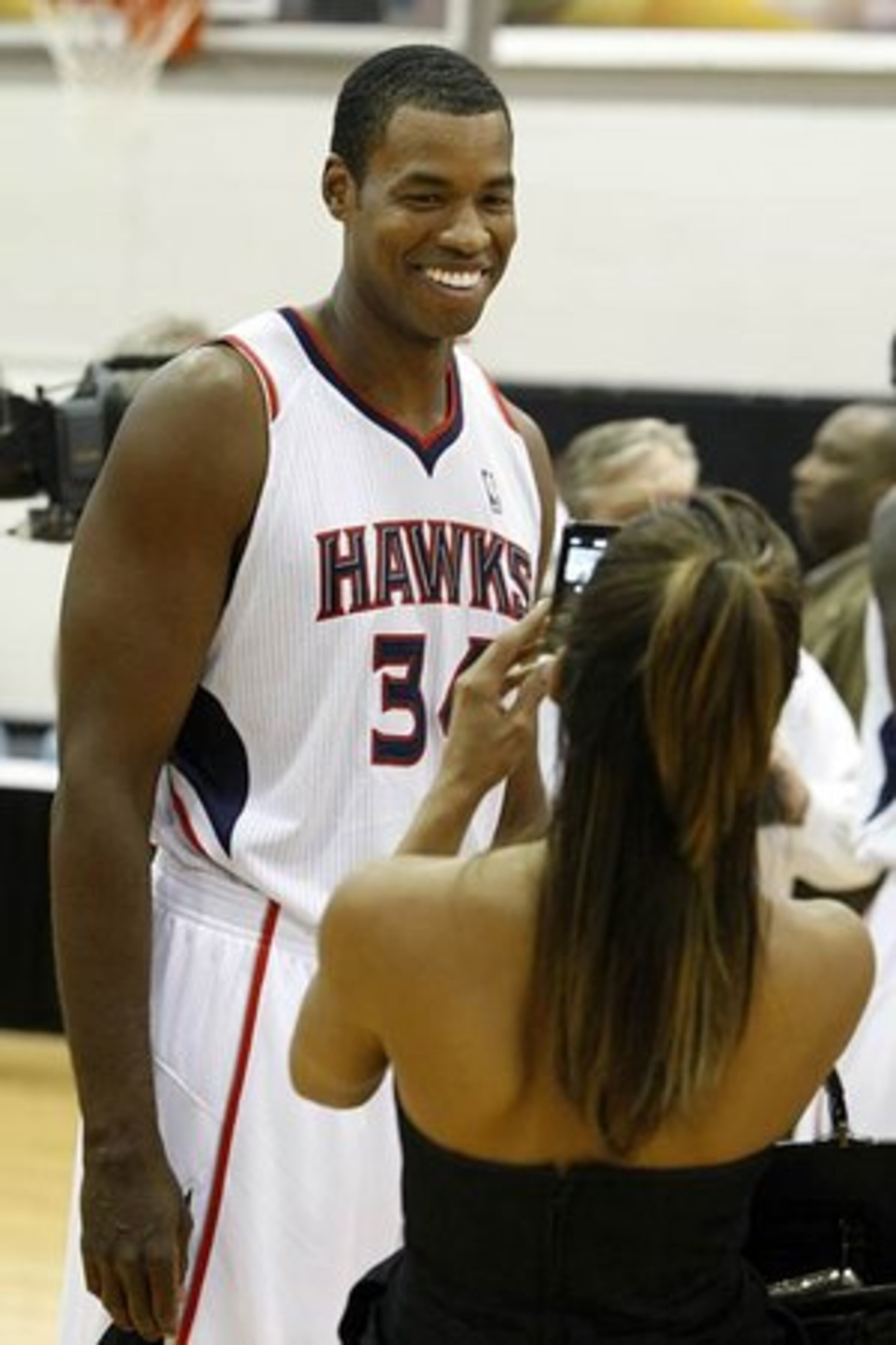 Center Jason Collins smiles at the camera during an interview on Hawks media day.