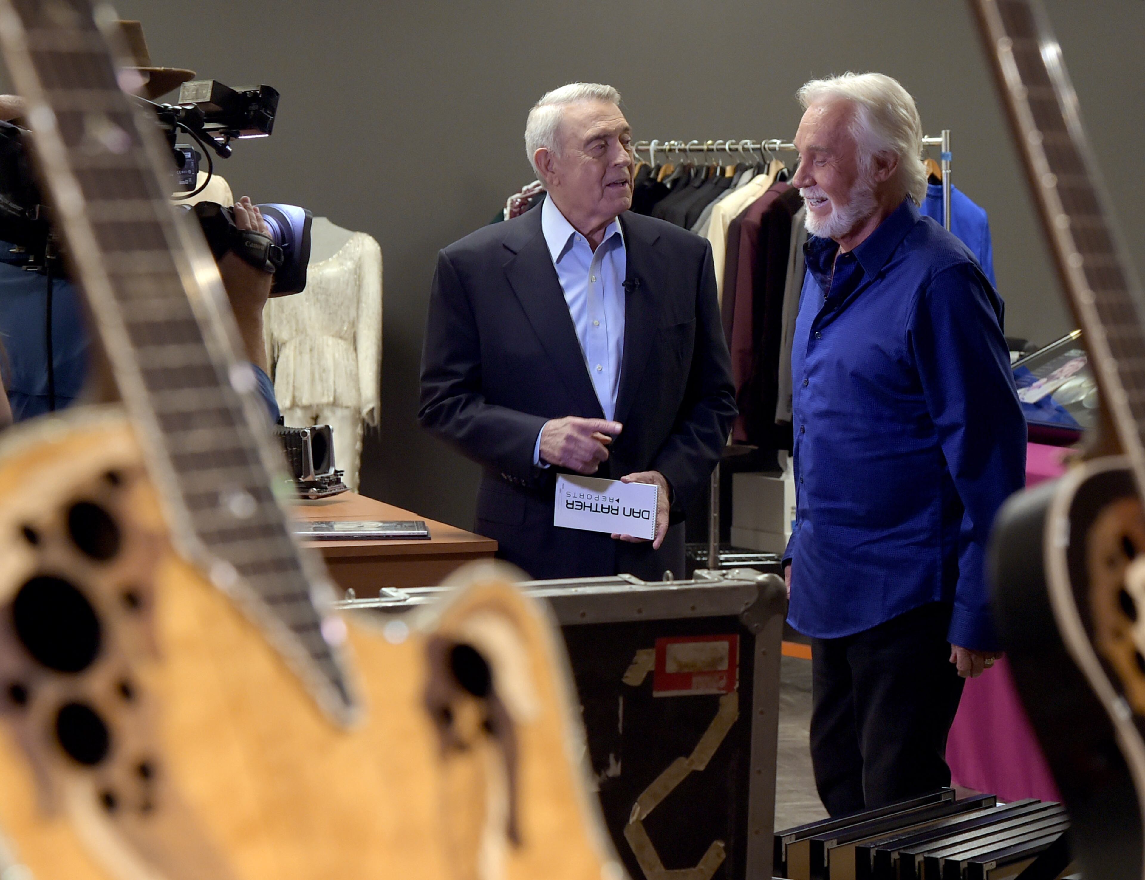 Dan Rather (right) interviews Kenny Rogers at The Country Music Hall of Fame and Museum on July 31, 2014 in Nashville. An exhibit highlighting Kenny Rogers' career will open at The Country Music Hall of Fame and Museum next month. "The Big Interview With Dan Rather" will air later this summer. (Photo by Rick Diamond/Getty Images for Dan Rather:The Big Interview)
