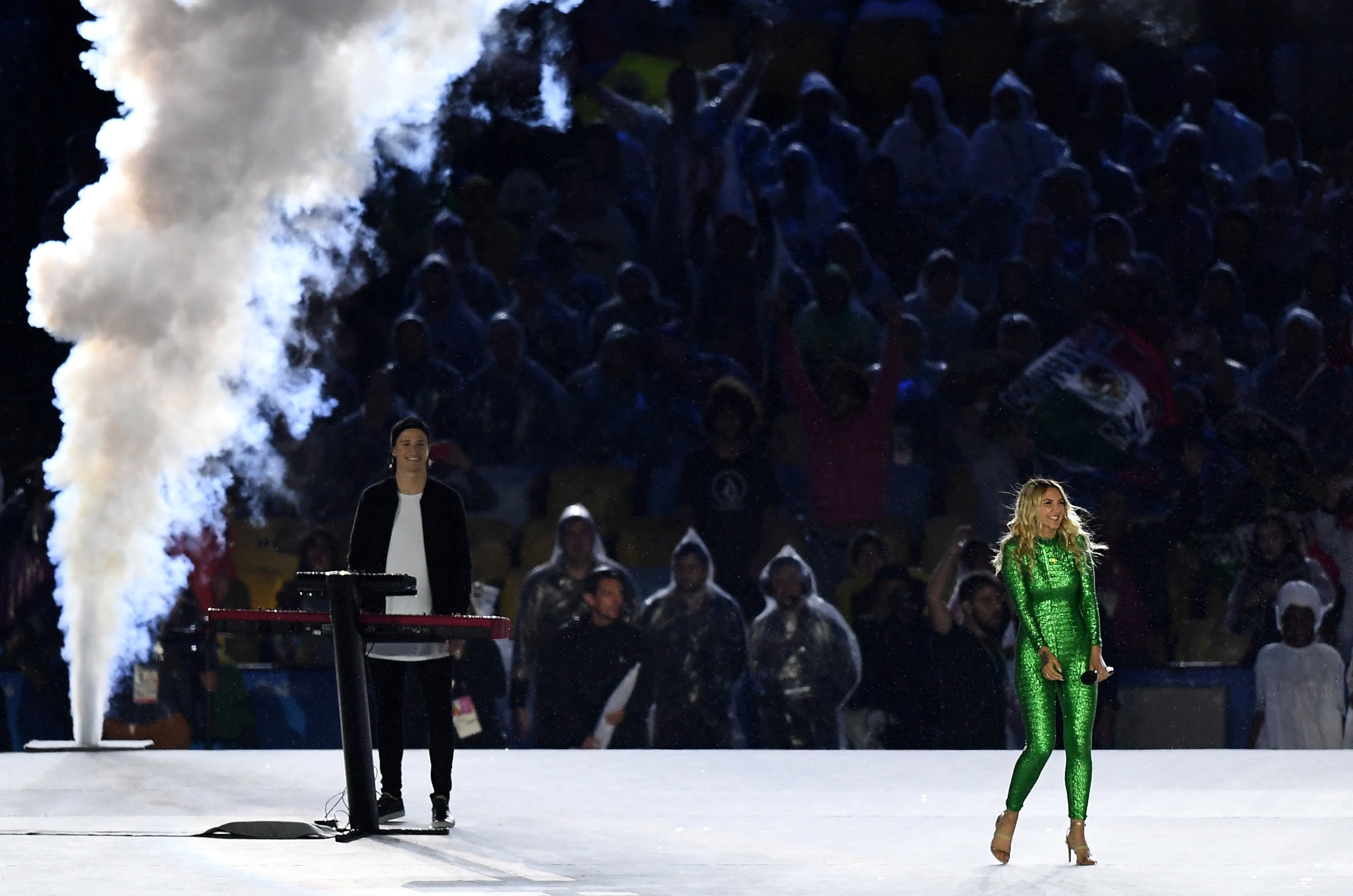 Electronic music artist Kygo and singer-songwriter Julia Michaels perform the song "Carry Me" during the Closing Ceremony on Day 16 of the Rio 2016 Olympic Games at Maracana Stadium on August 21, 2016 in Rio de Janeiro, Brazil. (Photo by Pascal Le Segretain/Getty Images)