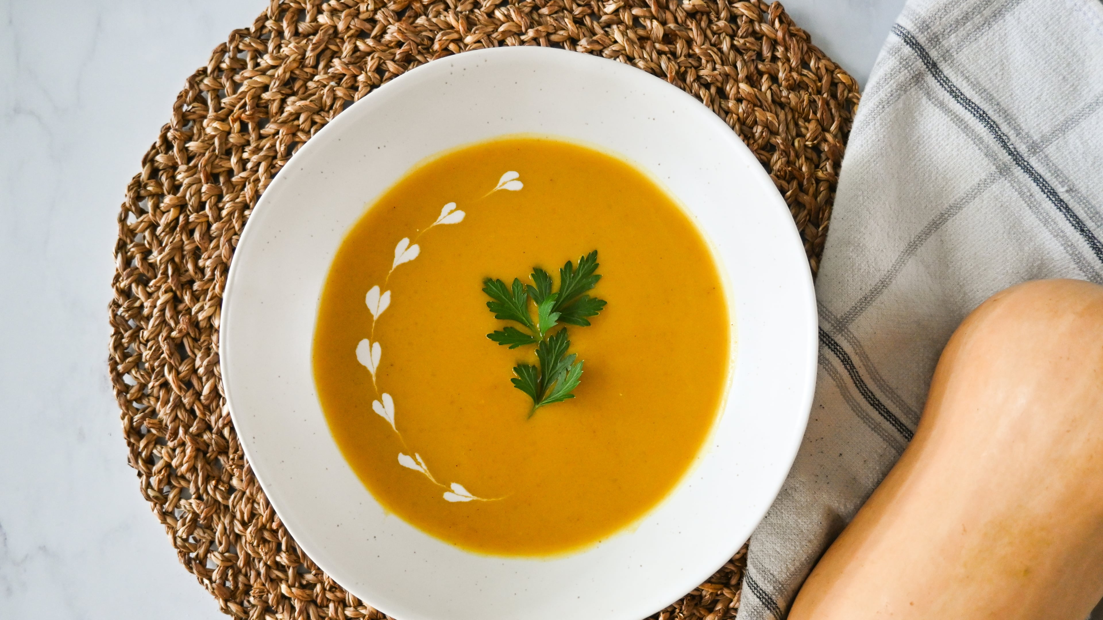 Curry powder and coconut milk add a rich flavor to this butternut squash soup recipe. (Candy Hom for the AJC)