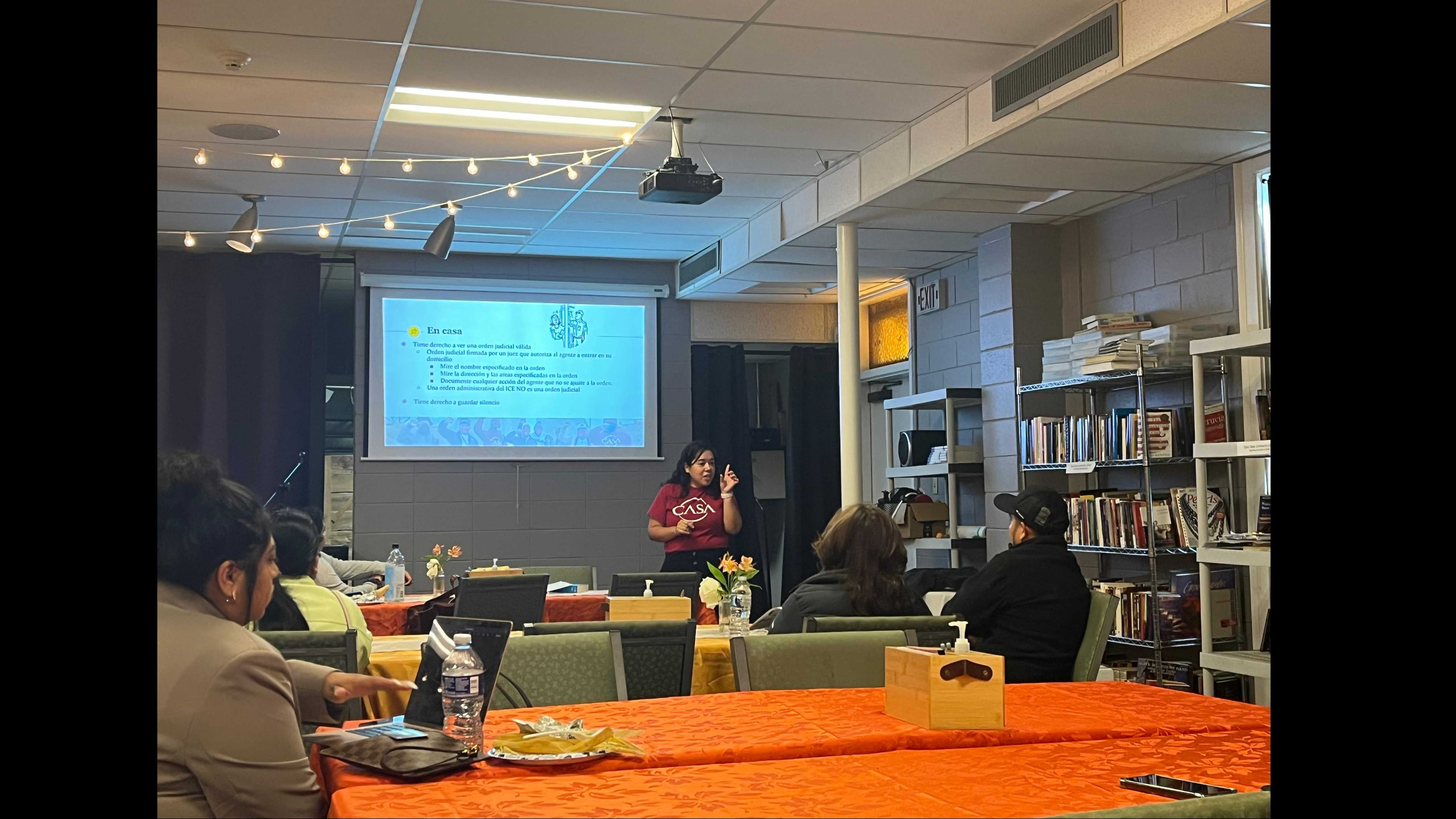 Stephanie Contreras, the Health Navigation and Social Services Manager for the immigrant rights group, CASA, speaks at a know your rights workshop Escuelitas on Buford Highway conducted in partnership with CASA and the Georgia Latino Alliance for Human Rights. Photo Credit: Escuelitas on Buford Highway.