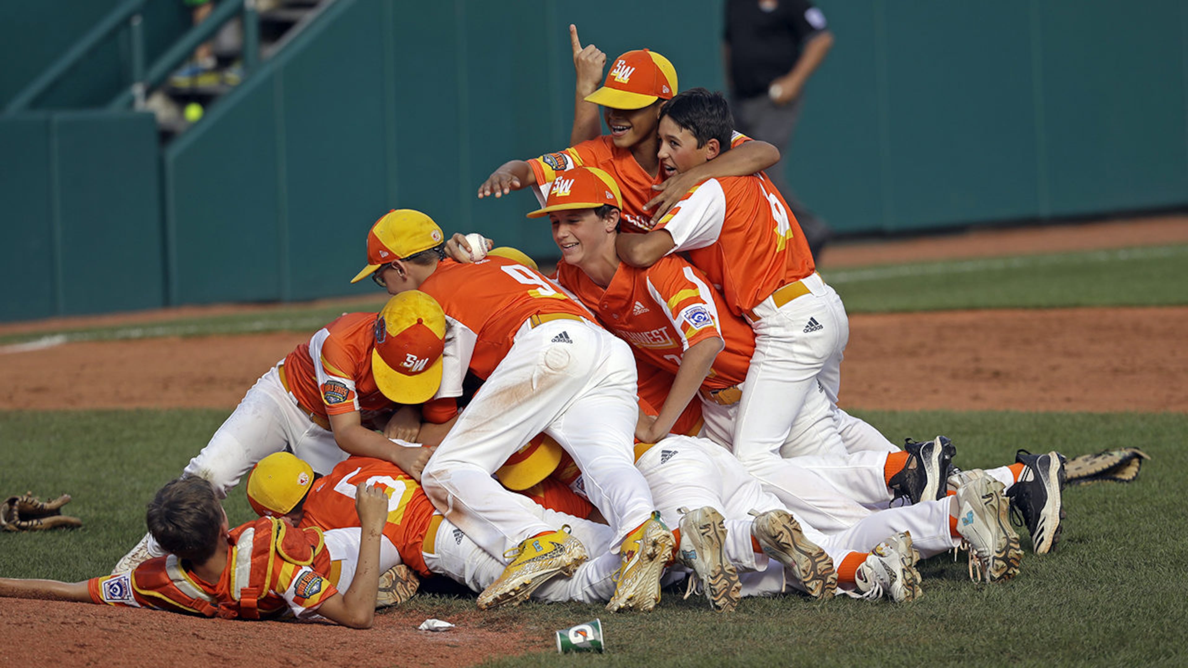 The baseball team from River Ridge, Louisiana, celebrates the 8-0 win against Curacao in the Little League World Series Championship game in South Williamsport, Pa., on Sunday, Aug. 25, 2019.