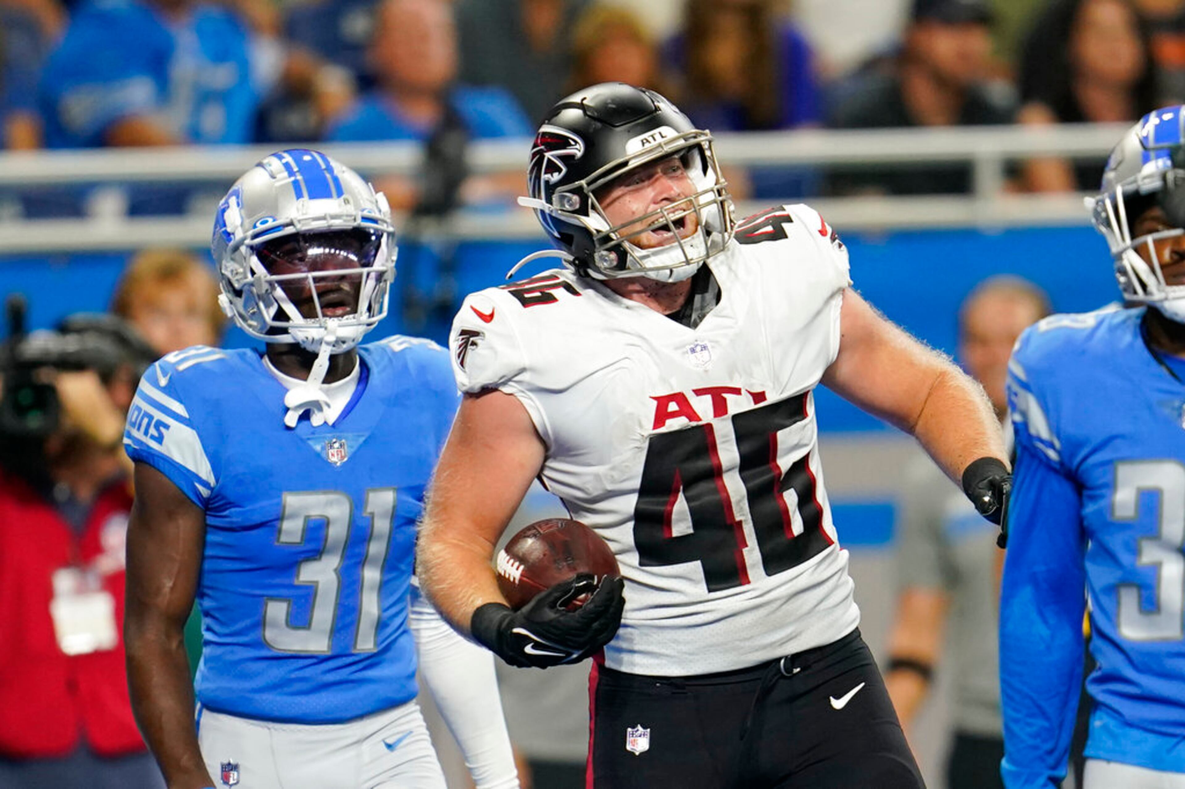 Atlanta Falcons tight end Parker Hesse (46) celebrates his touchdown during the first half of a preseason NFL football game against the Detroit Lions, Friday, Aug. 12, 2022, in Detroit. (AP Photo/Paul Sancya)