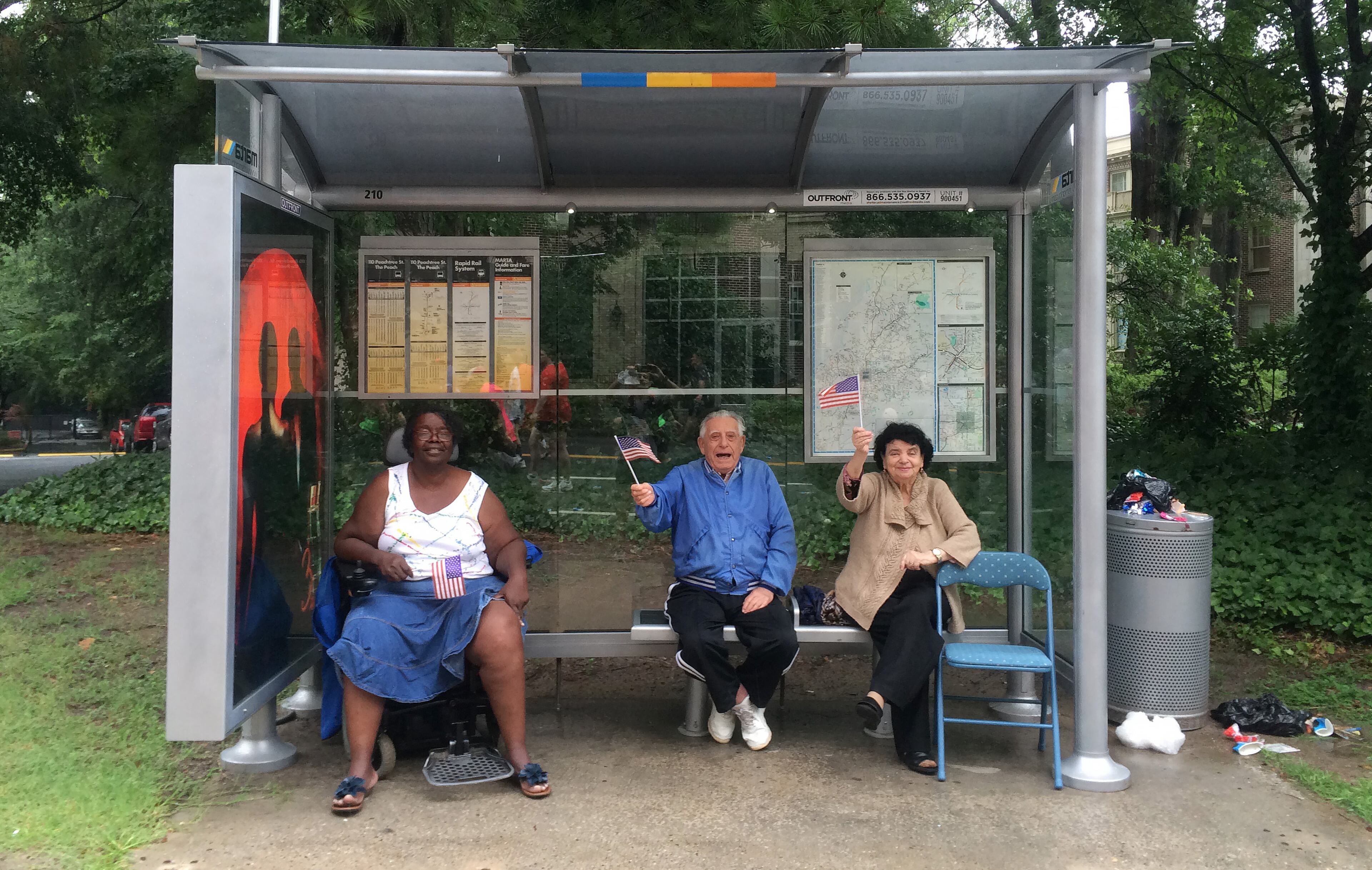 Late in the AJC Peachtree Road Race only a few fans remained to cheer runners and walkers on Saturday July 4, 2015.