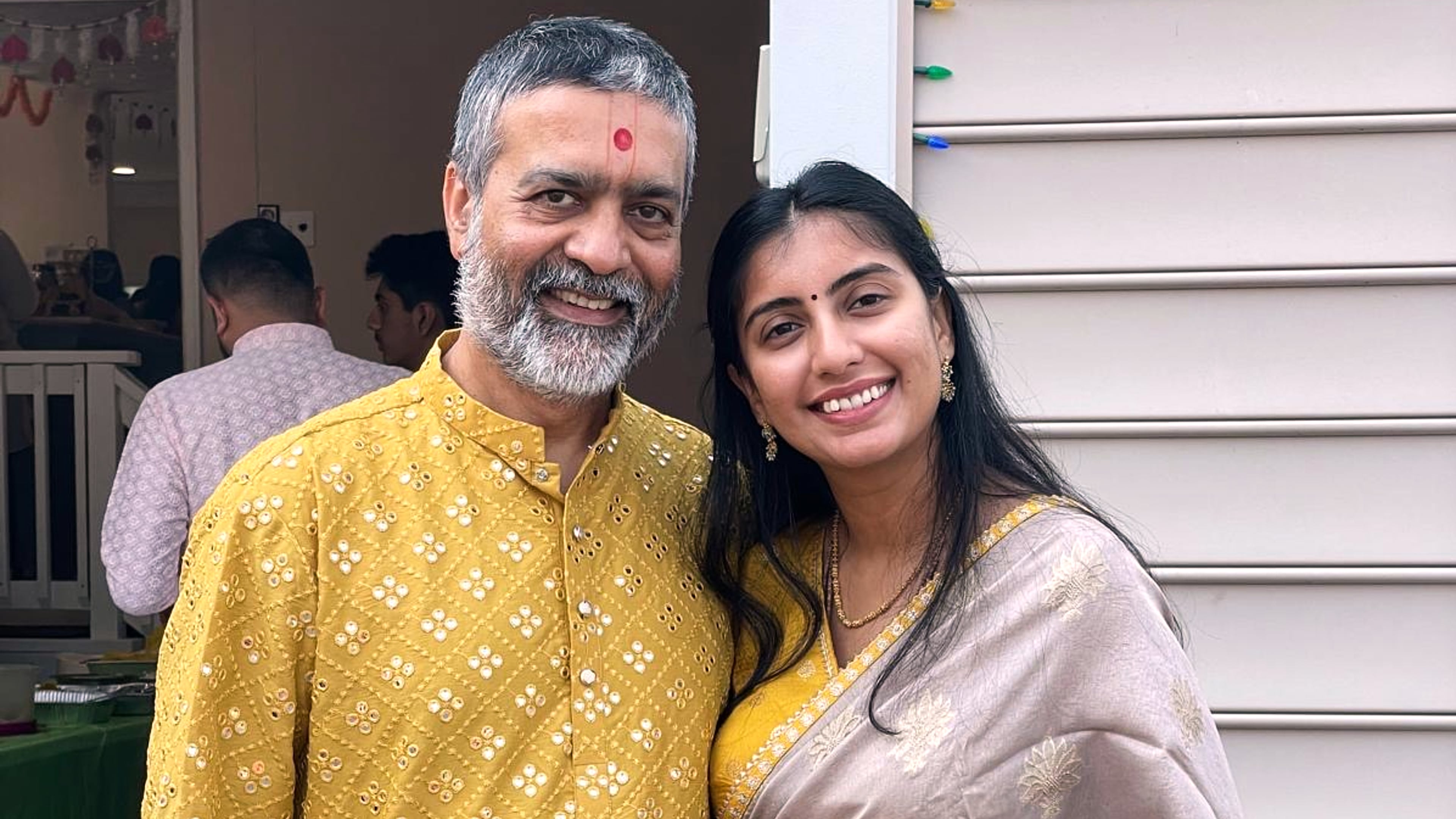 This 2022 photo provided by Mukti Patel shows Umesh Kumar and his daughter, Akanksha, in Richmond, Va. (Mukti Patel via AP)