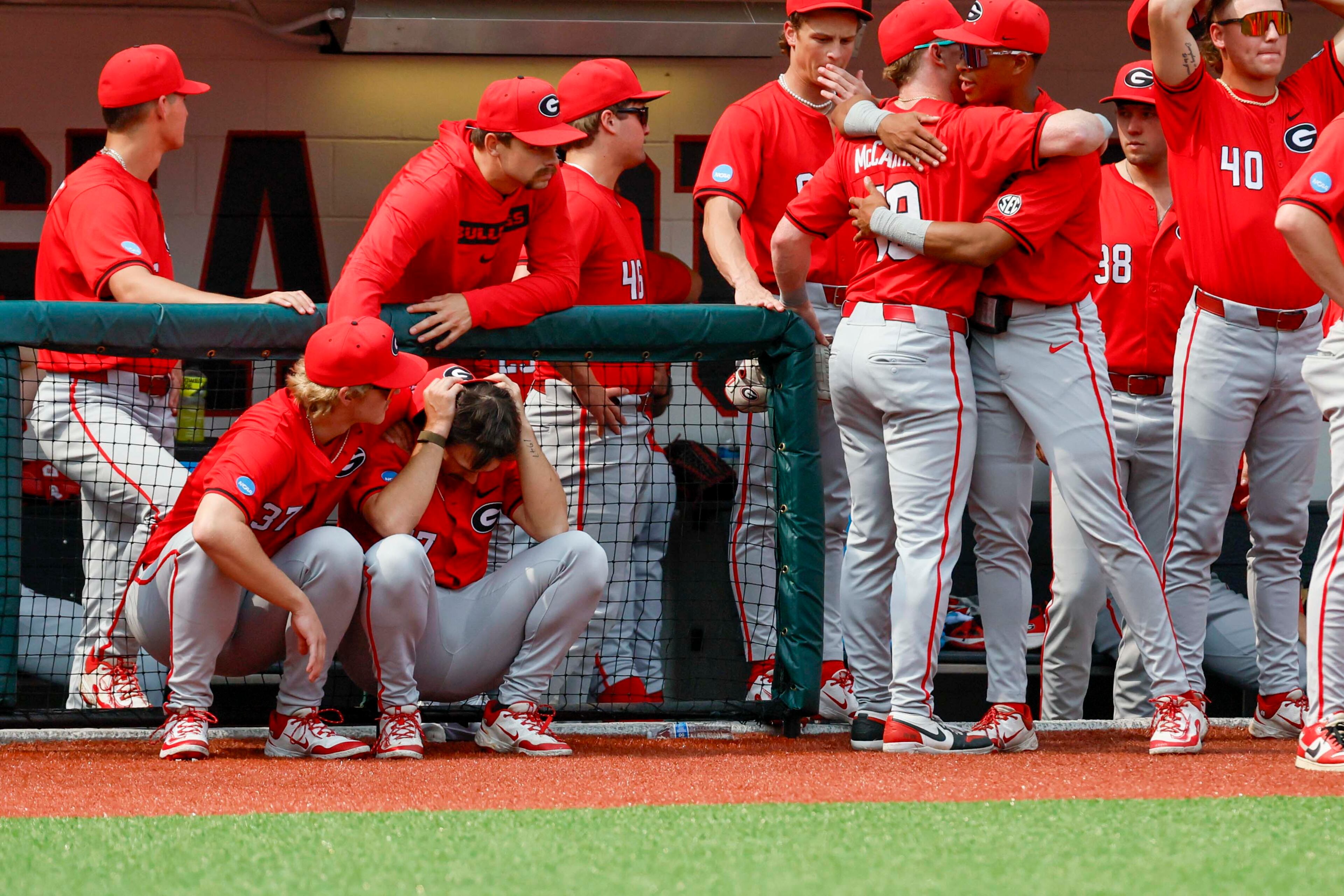 Georgia players react with disbelief after losing against Oklahoma State on a walk-off homer during the ninth inning in their NCAA Regional game at Foley Field, Sunday, June 1, 2025, in Athens, Ga. Oklahoma State defeated Georgia 11-9.
(Miguel Martinez/ AJC)