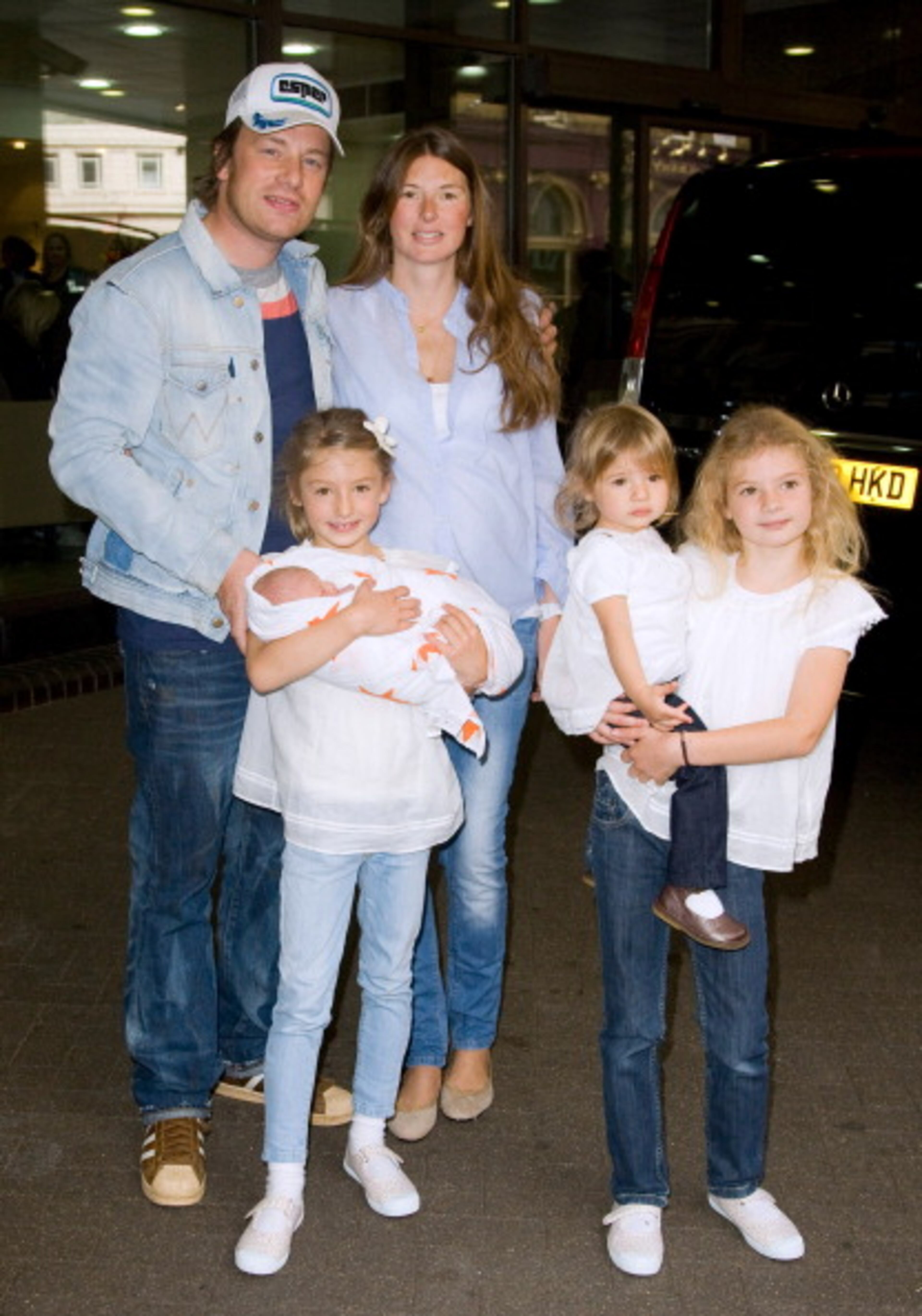 Jamie And Jools Oliver, With Daughters Poppy Honey, Daisy Boo And Petal Blossom Rainbow, Leaving The Portland Hospital On Great Portland Street In Central London With Their New Son Buddy Bear Maurice Oliver. (Photo by John Phillips/UK Press via Getty Images)