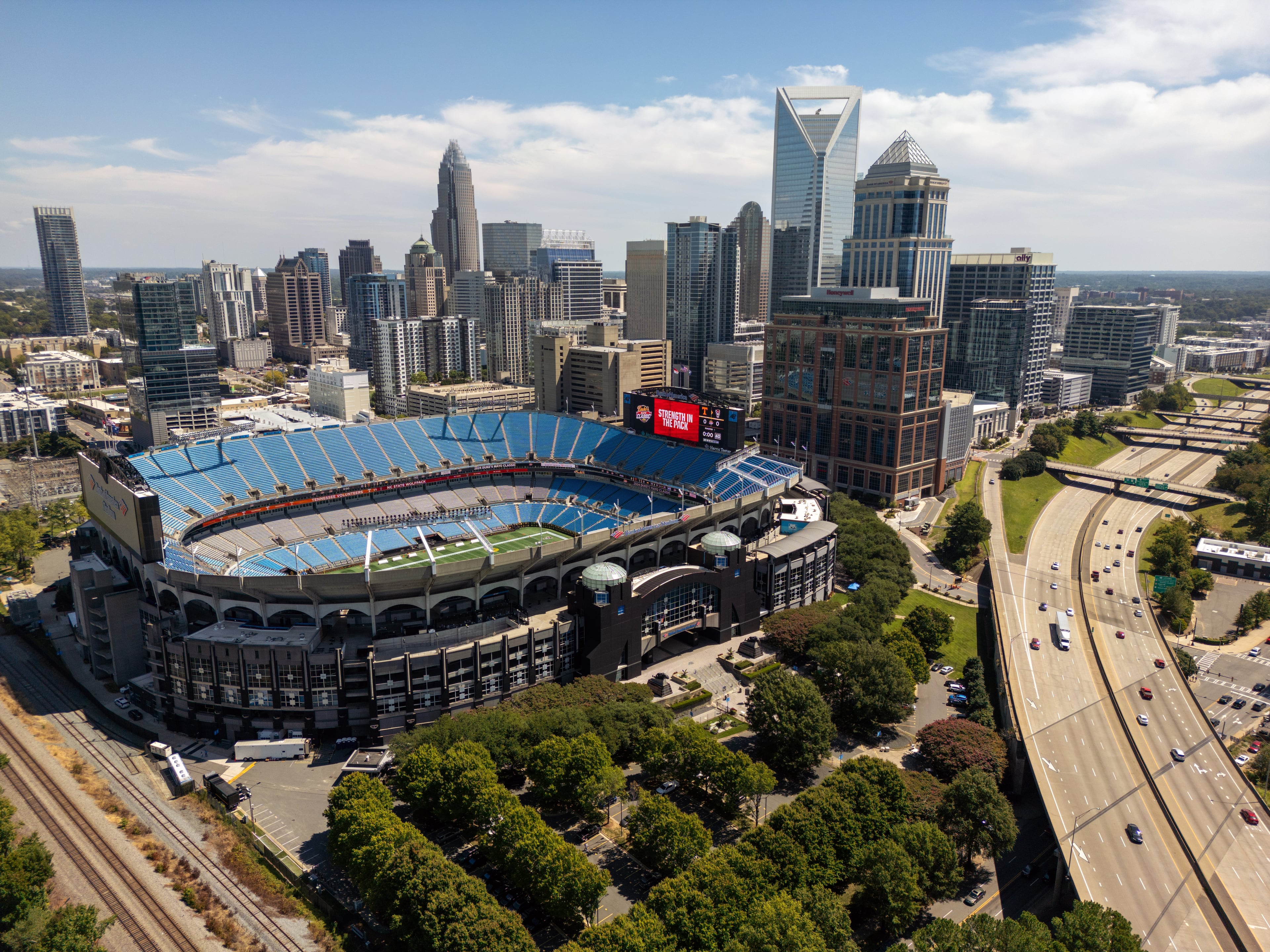Beyond a city of polished glass and bank towers, is the enduring spirit of revival in Charlotte, N.C. (Lance King/Getty Images)