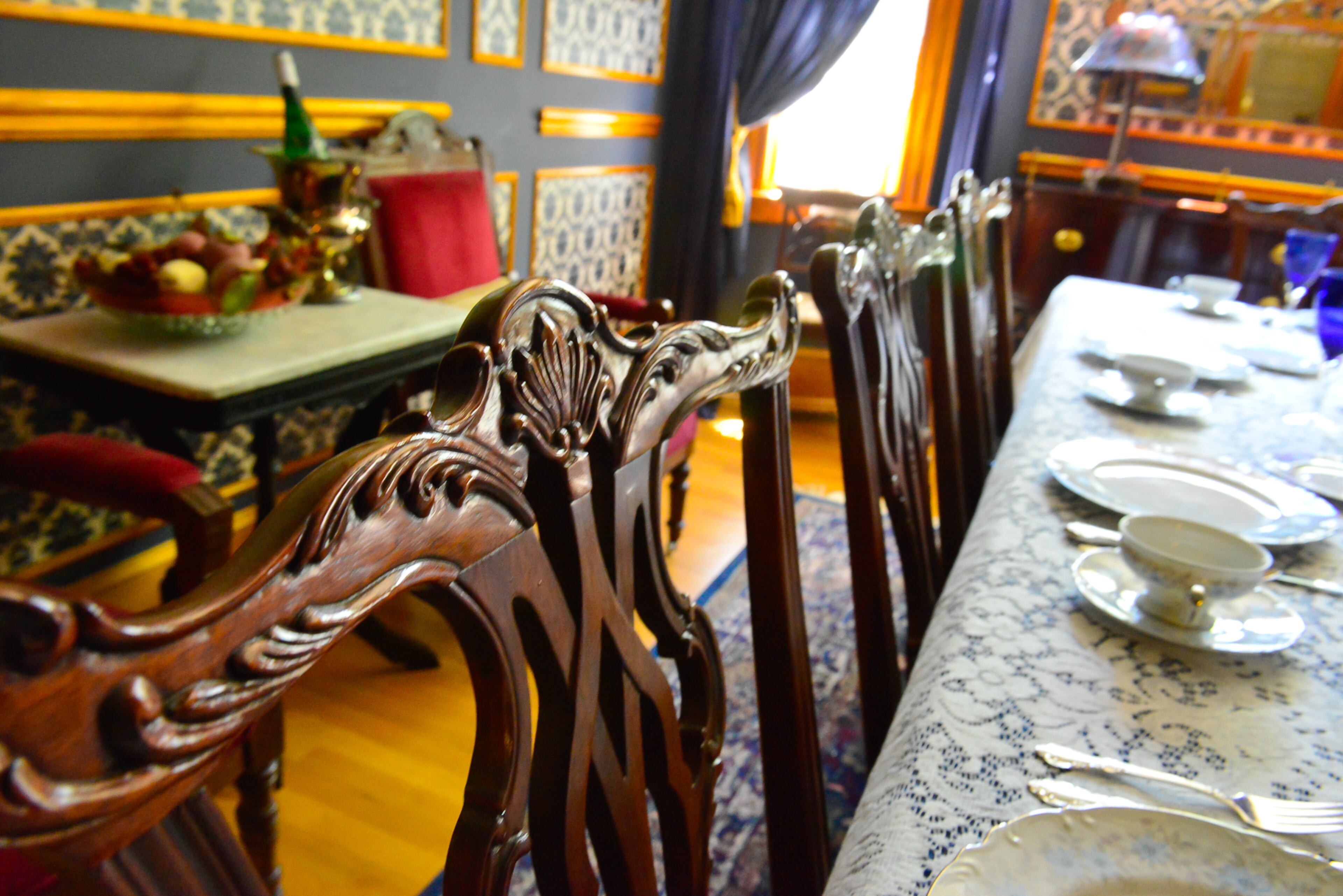 A friend previously owned the table, chairs and china cabinet in the dining room, which has a blue and cream color scheme and formal look.