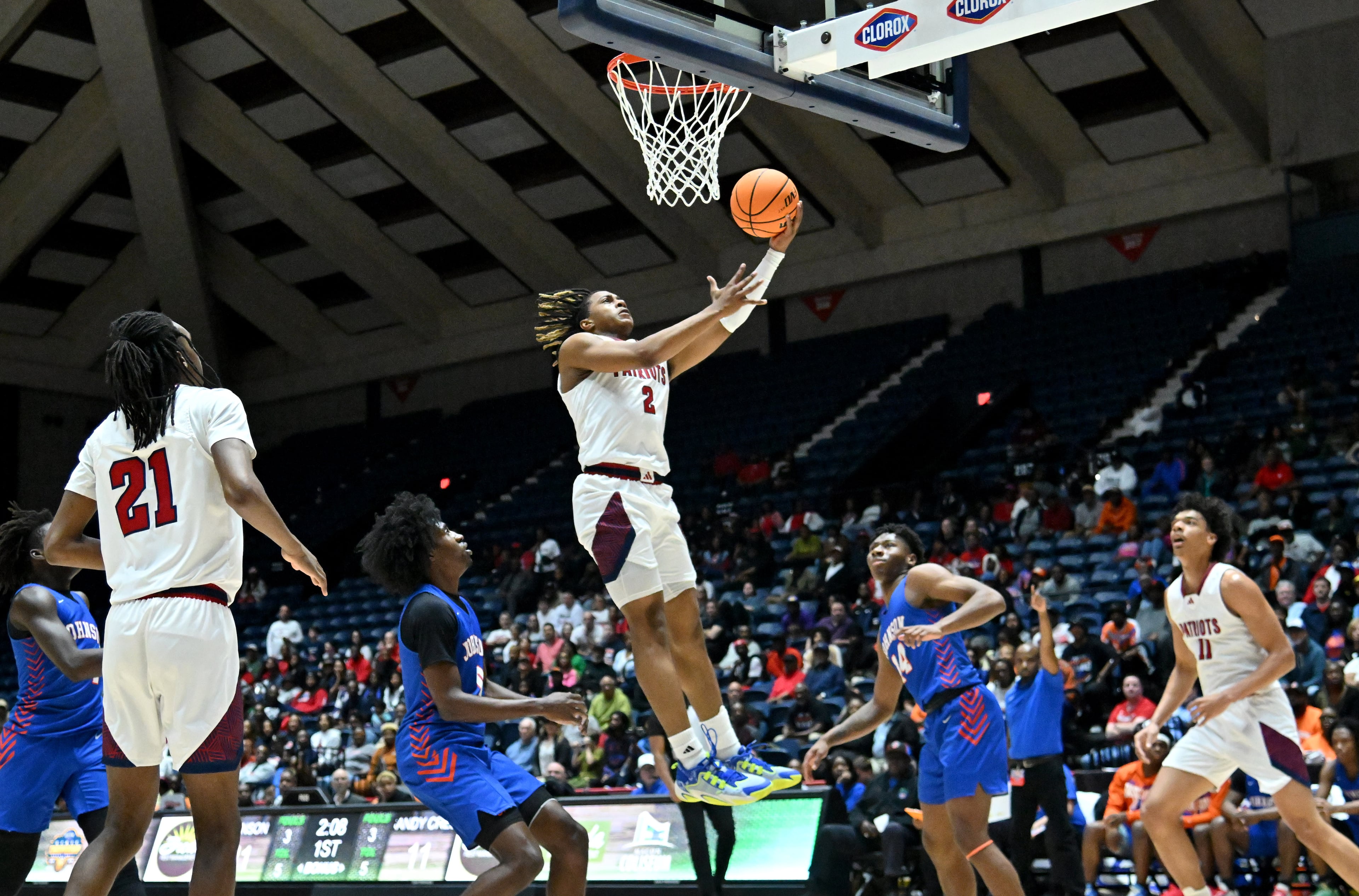 Sandy Creek's Jacobi Robinson (2) goes to the basket for a shot during the first half of GHSA Basketball Class 3A Boy’s State Championship game at the Macon Centreplex, Friday, Mar. 8, 2024, in Macon. (Hyosub Shin / Hyosub.Shin@ajc.com)