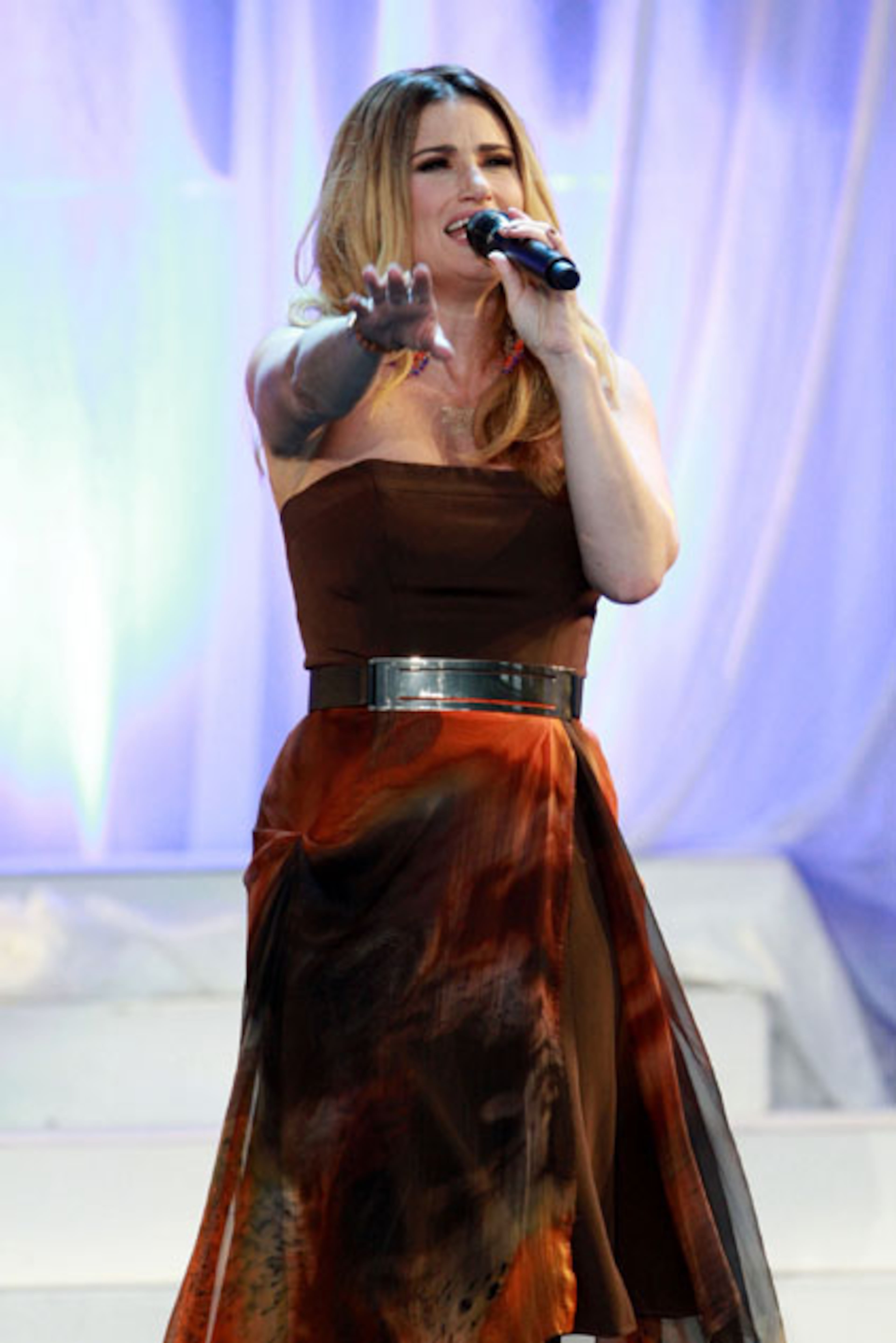 Actress and singer Idina Menzel entertained a large crowd At Chastain Park on Friday night, July 24, 2015. Known for her roles on Broadway in "Rent" and "Wicked". Menzel also was a member of the cast in the TV series "Glee", portraying Skelby Corcoran. The Tony Award winner is recently known for the song "Let It Go" from the film "Frozen." Robb D. Cohen /.RobbsPhotos.com