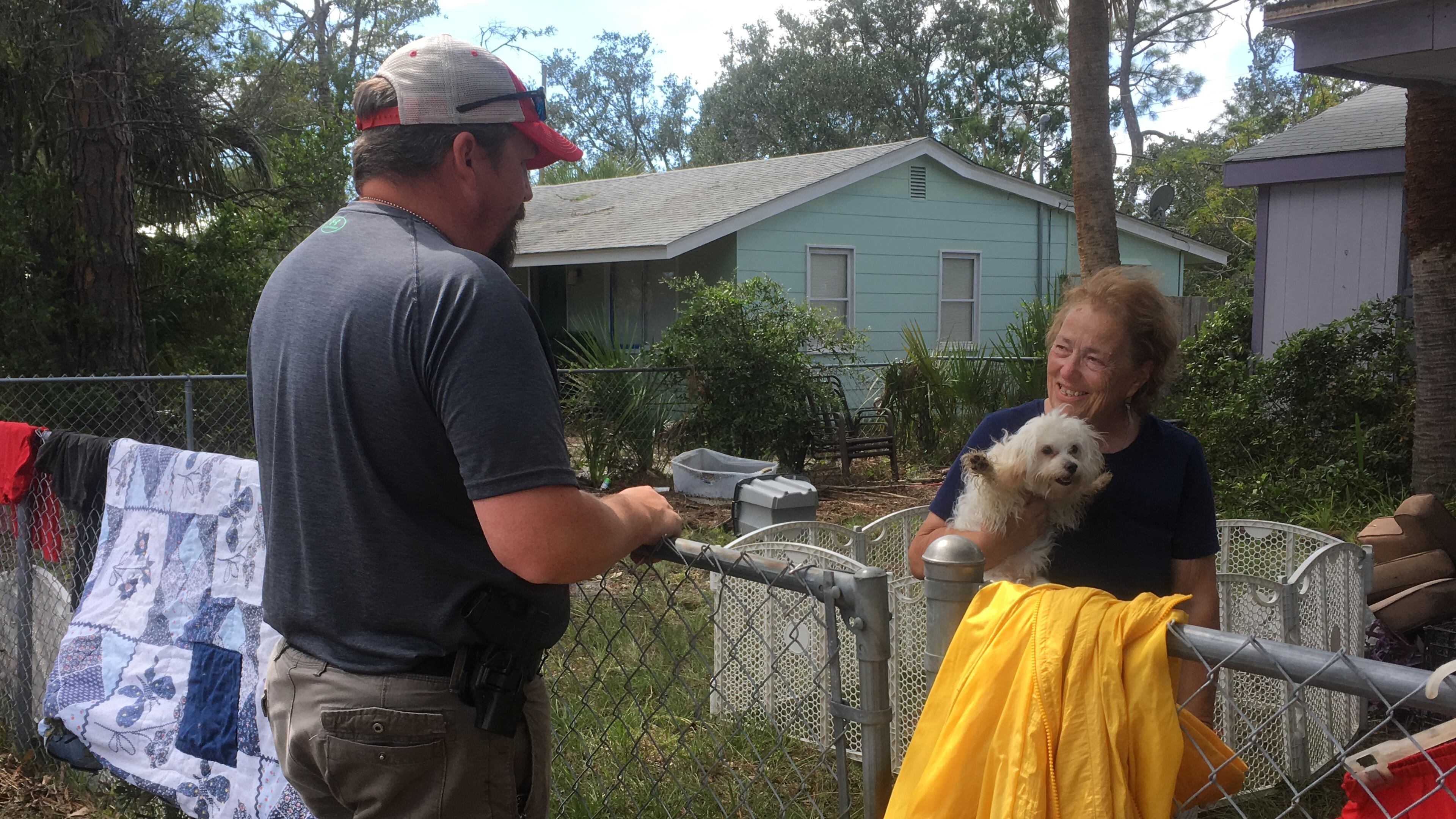 "Mama, you want a Chick-fil-A?" the Tybee police officer asked June Saunders when he went to check on her (and her Maltipoo Camee Rae) Tuesday afternoon. Saunders, whose son is on the force, wasn't actually sure what the nice young man's name was. "They all call me Mama," she said. Photo: Jennifer Brett, jbrett@ajc.com