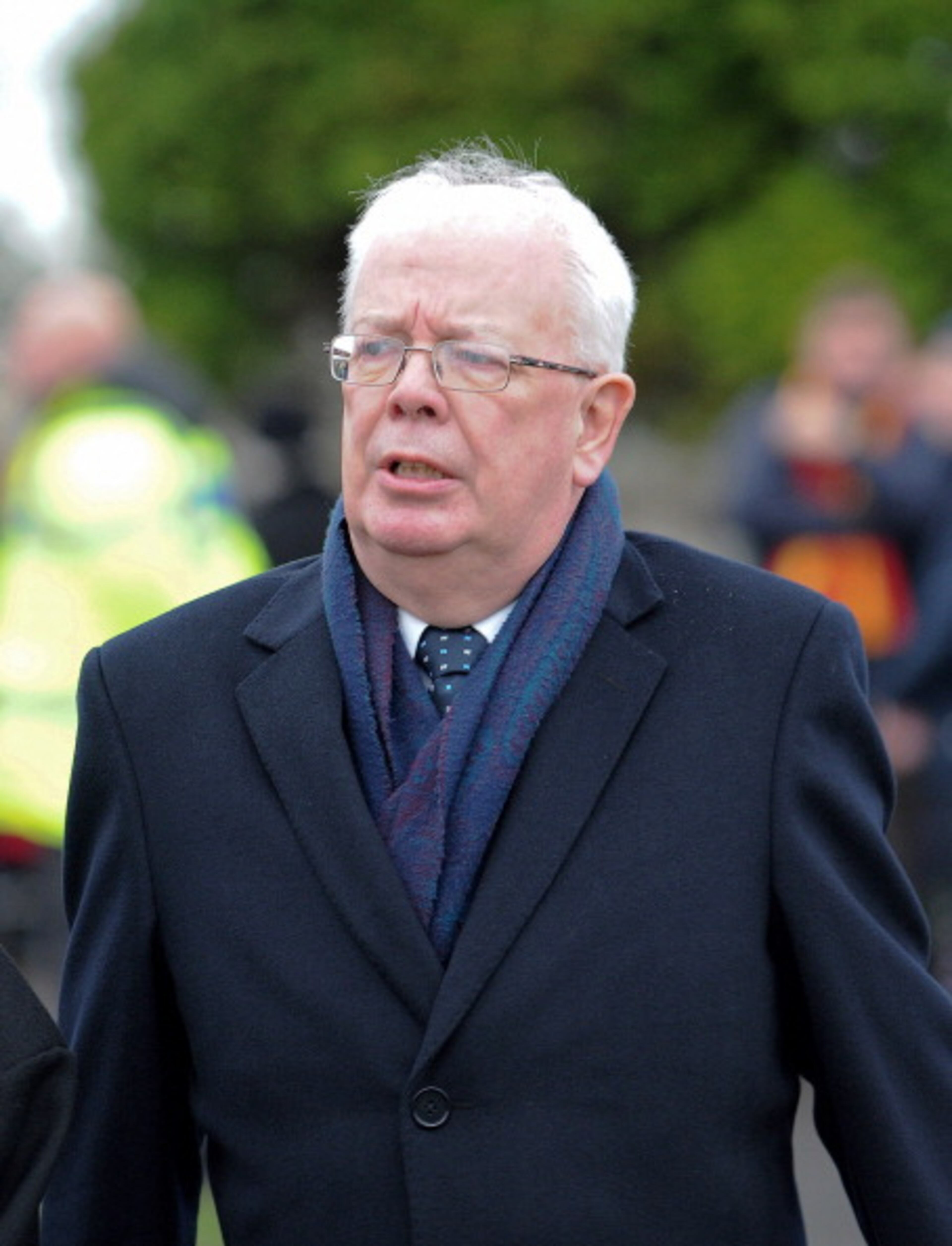 LOCKERBIE, SCOTLAND - DECEMBER 21: Lord Wallace the Advocate General for Scotland arrives at a memorial service in Dryfesdale cemetery to commemorate the 25th anniversary of the air disaster on December 21, 2013 in Lockerbie, Scotland. Pan Am Flight 103 exploded over Lockerbie on December 21st, 1988, killing all those on board and a further eleven on the ground. (Photo by Ian Forsyth/Getty Images)