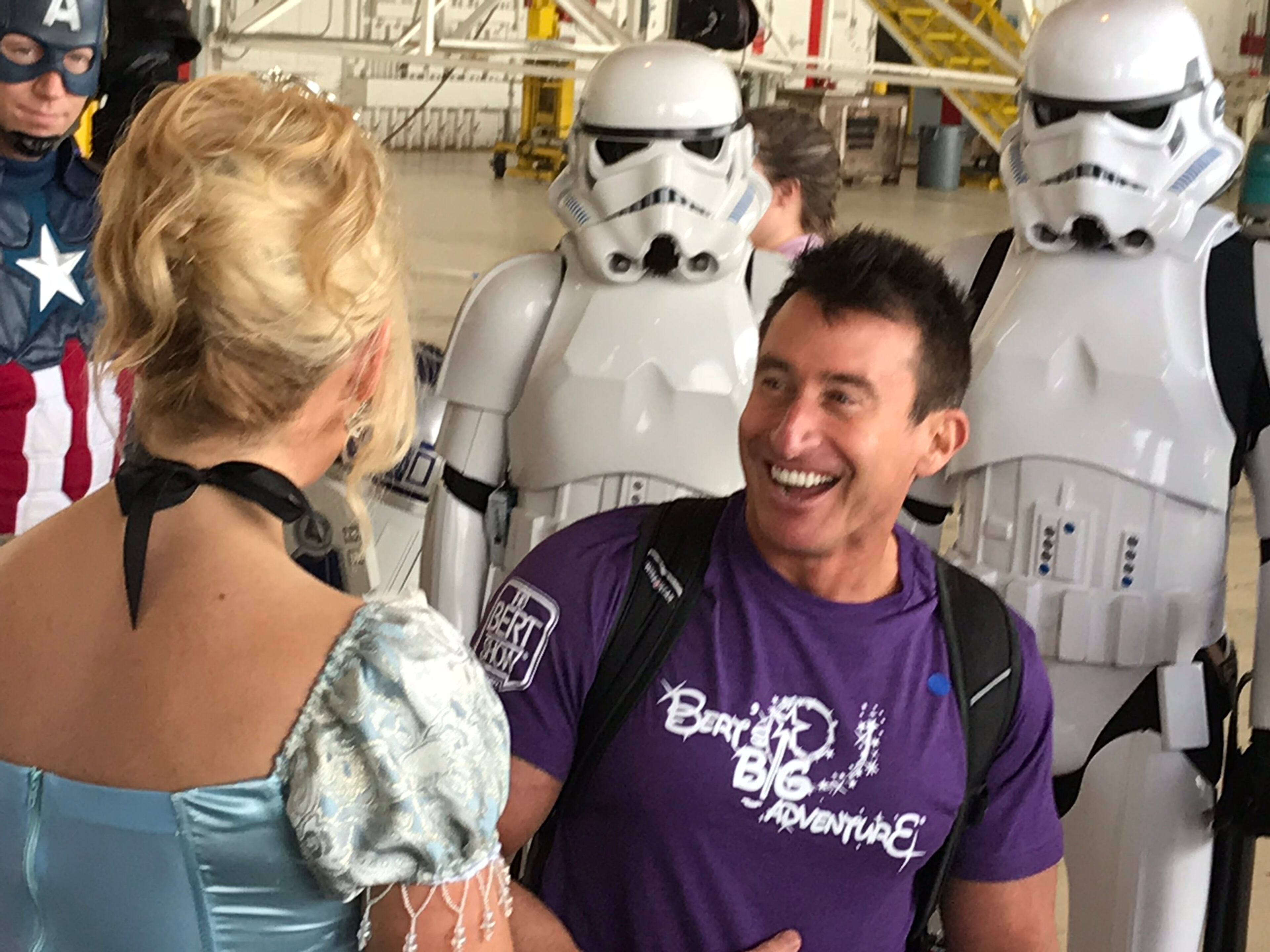 Bert Weiss on the red carpet leading up to the plane. CREDIT: Rodney Ho/rho@ajc.com
