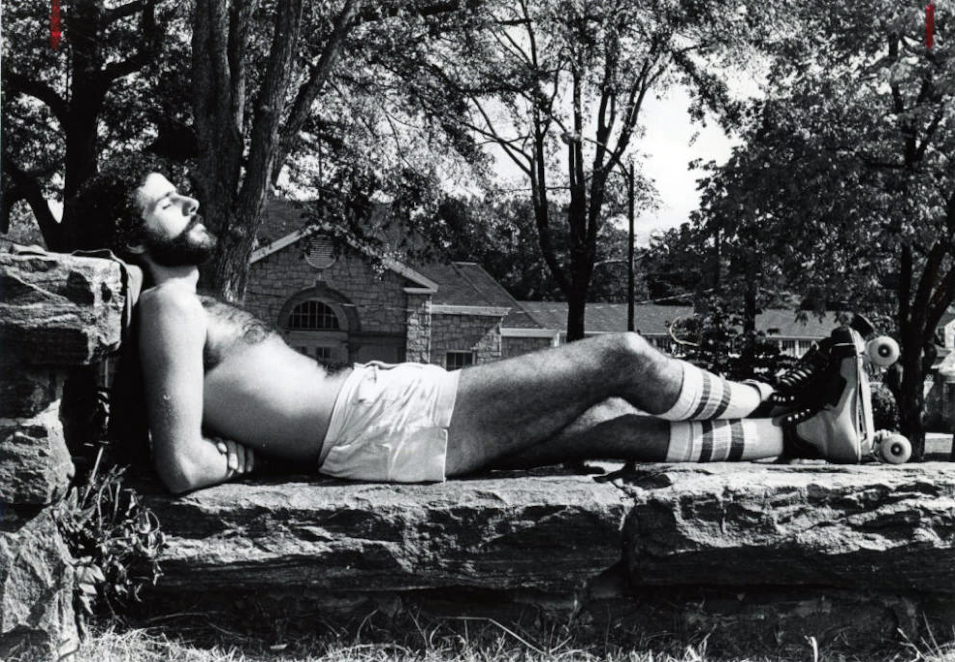 It was obviously a very warm autumn day as Jan Nichols took a break from roller skating to sunbath on a stone wall in Piedmont Park on October 21, 1979.