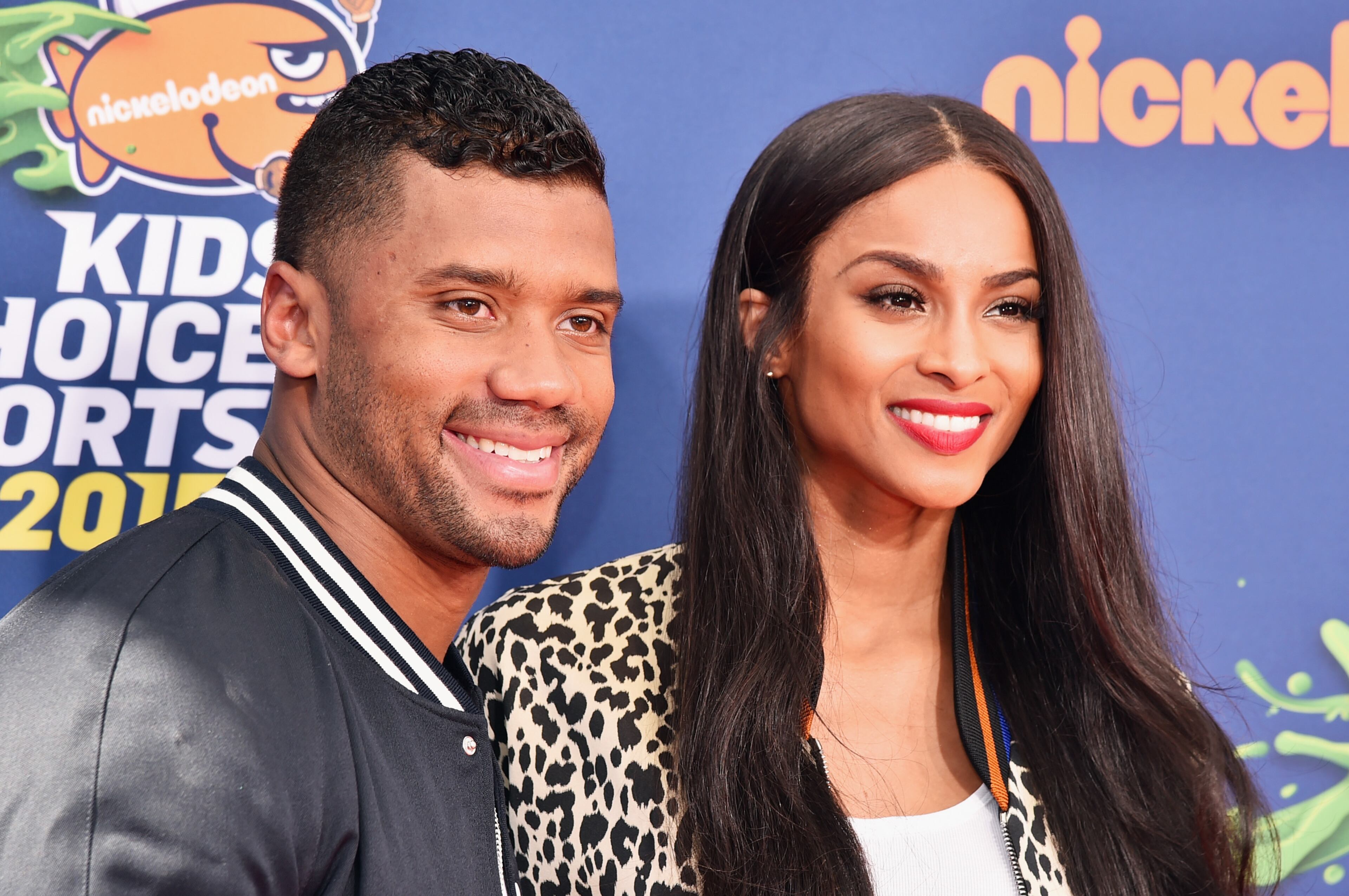 WESTWOOD, CA - JULY 16: Host Russell Wilson (L) and recording artist Ciara attend the Nickelodeon Kids' Choice Sports Awards 2015 at UCLA's Pauley Pavilion on July 16, 2015 in Westwood, California. (Photo by Alberto E. Rodriguez/Getty Images For KCSports2015)