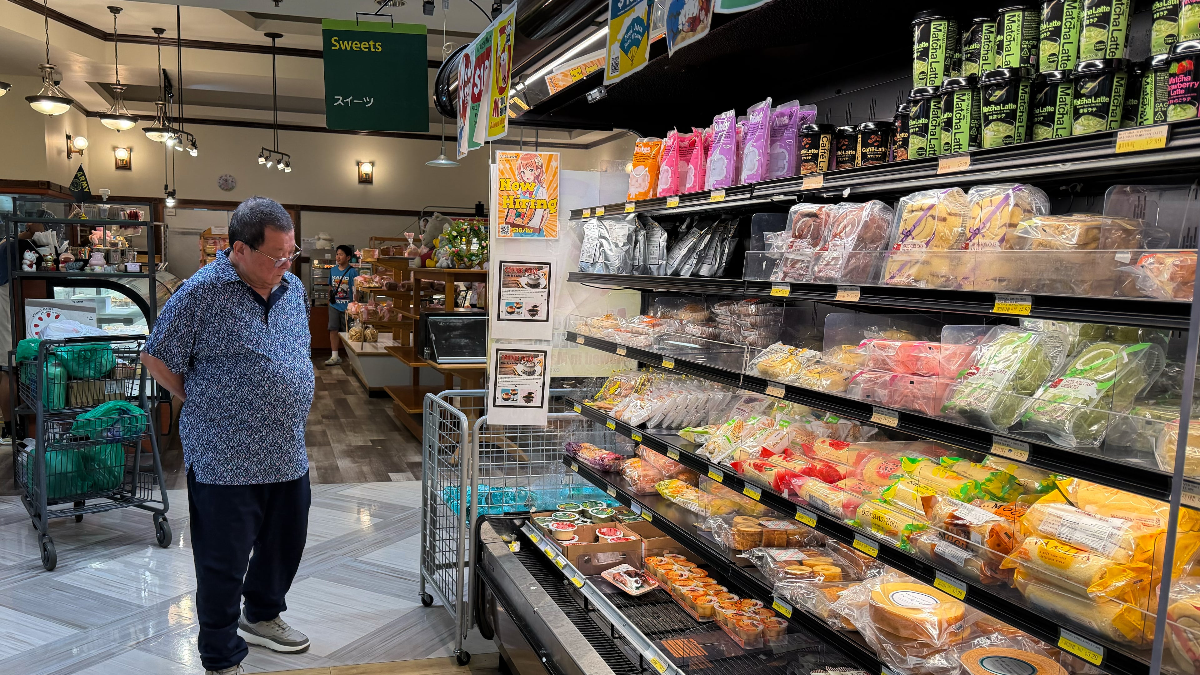 A customer shops at a grocery store in Arlington Heights, Ill., Monday, July 6, 2026. (AP Photo/Nam Y. Huh)