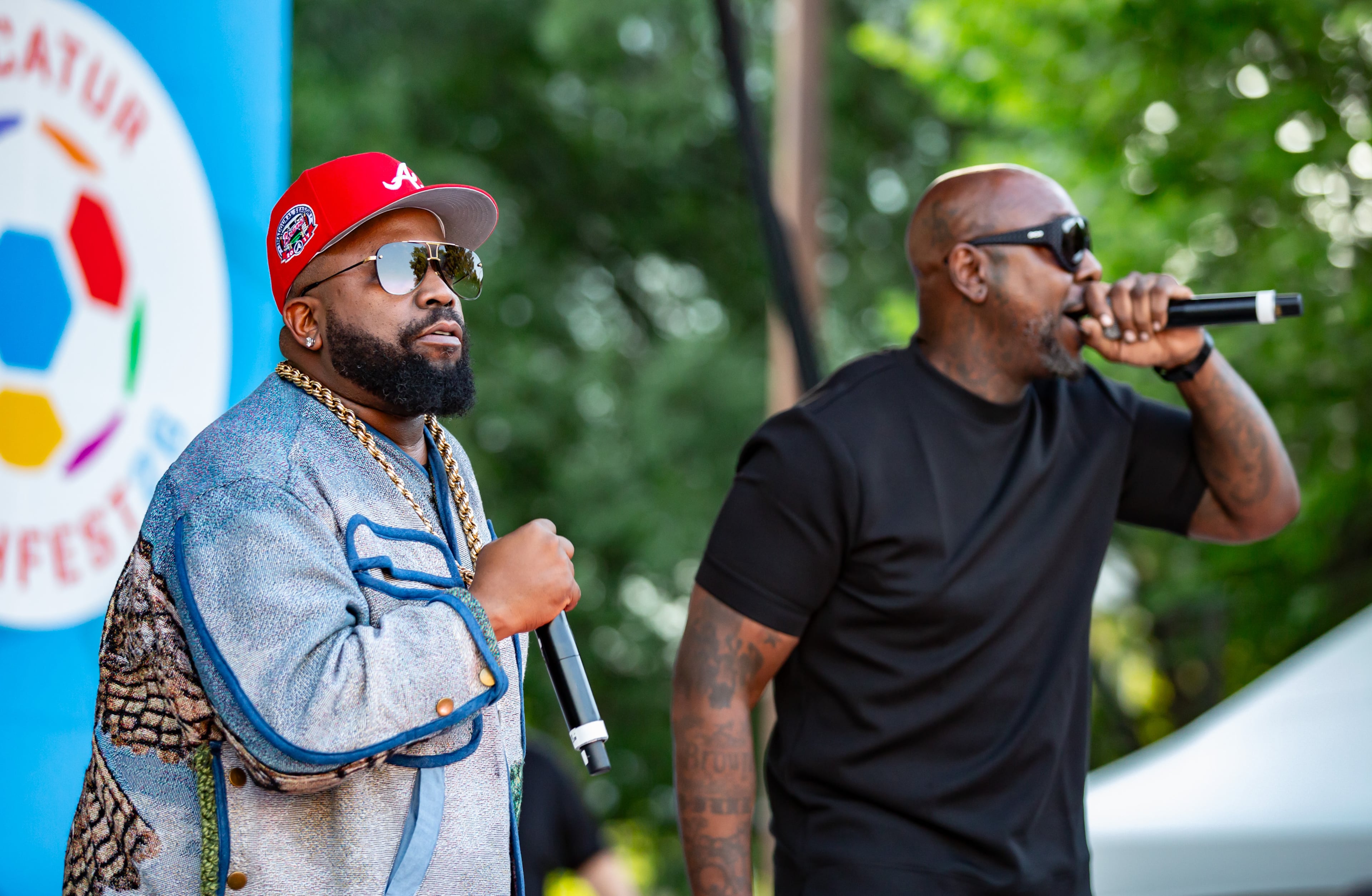 Big Boi (left) and Sleepy Brown blaze through an hour of hits to kick off Decatur WatchFest '26 on Thursday, June 11, 2026 at Decatur Square. (Ryan Fleisher for the AJC)