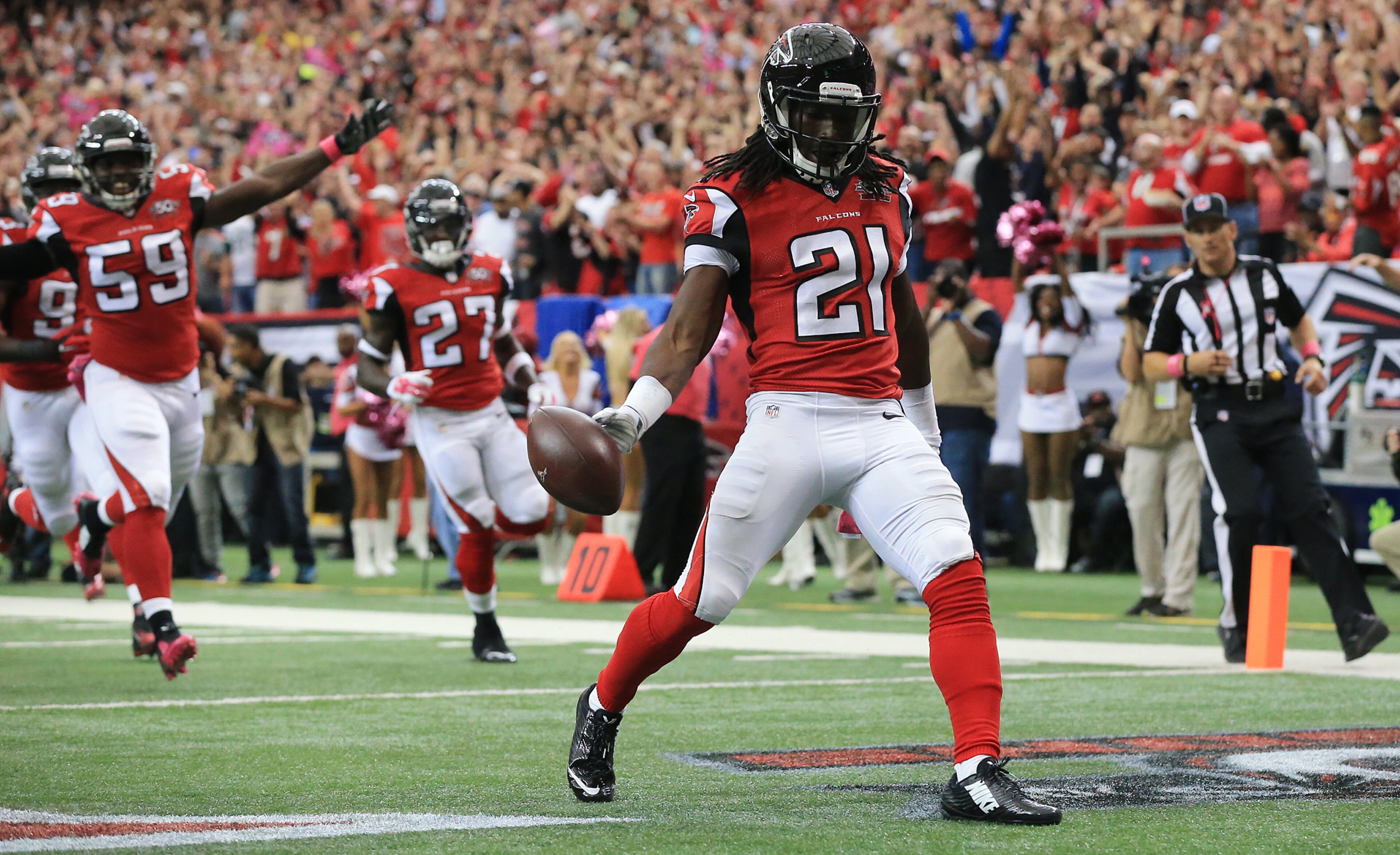 Falcons cornerback Desmond Trufant returns a Texans fumble for a defensive touchdown and a 21-0 lead during the second quarter in a football game on Sunday, Oct. 4, 2015, in Atlanta.