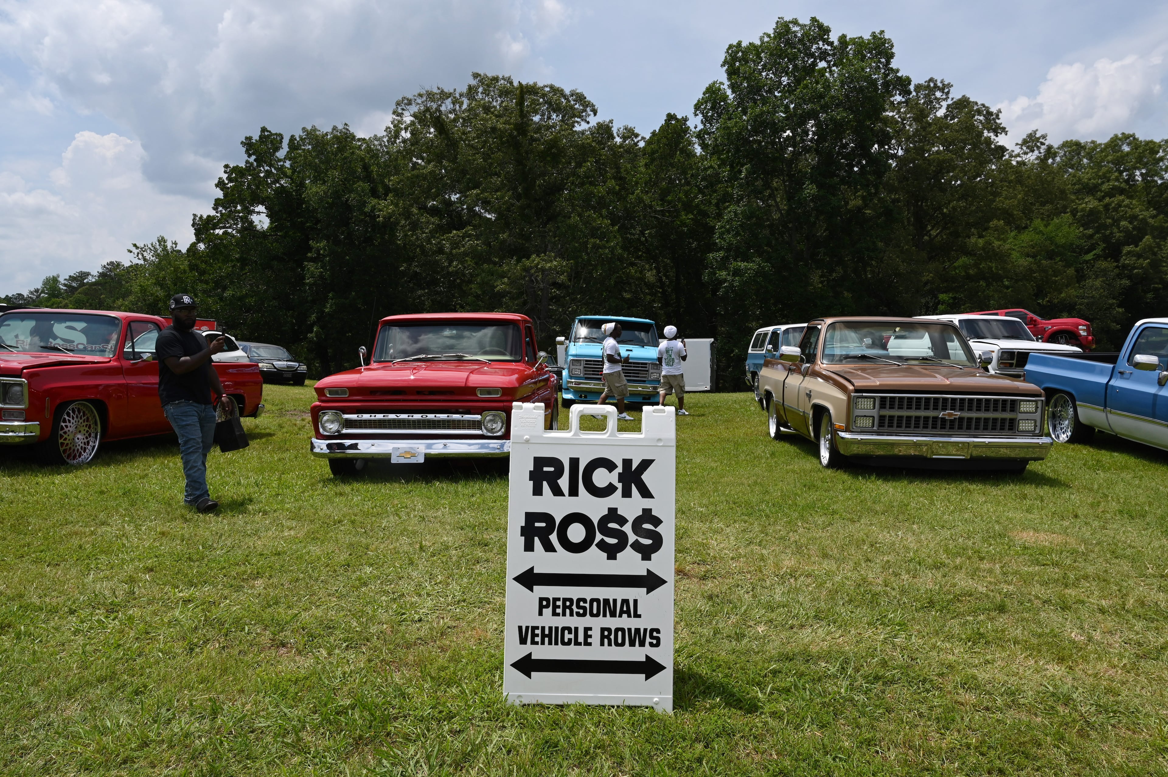 Rick Ross’s personal vehicles are displayed during the 4th Annual Rick Ross Car and Bike Show, Saturday, June 7, 2025, in Fayetteville. The 4th Annual Rick Ross Car and Bike Show will include a vendor market with more than 30 vendors, food trucks, fleets of classic/custom automobiles, luxury vehicles, boats, RVs and trailers on the front of the mansion. Stage performances include Plies, Ross' new signee Nino Breeze and Ross himself. (Hyosub Shin / AJC)