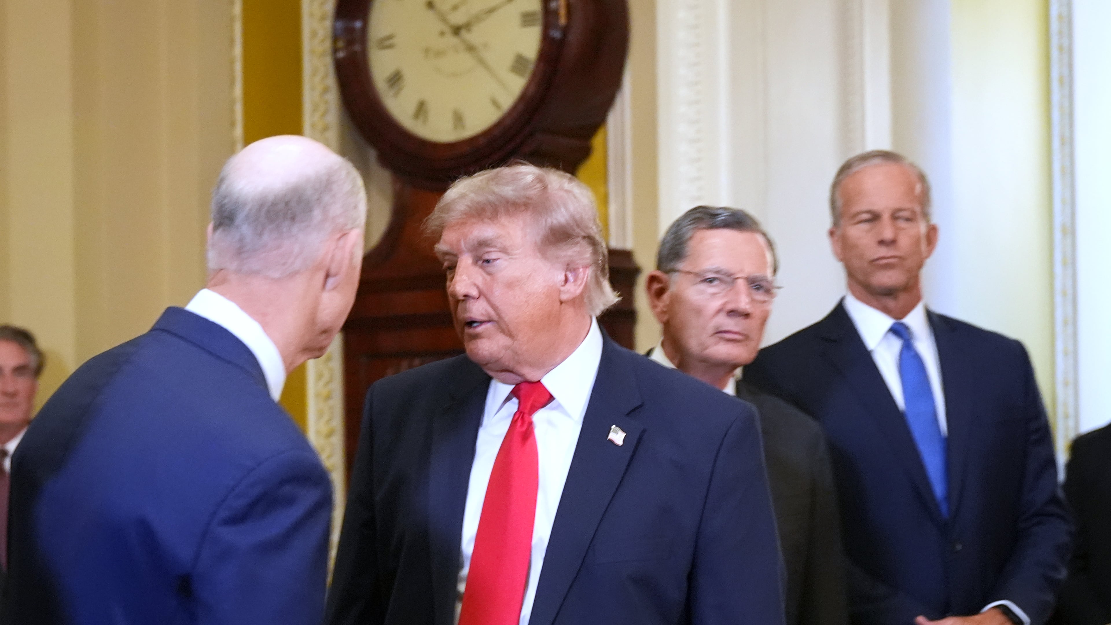 President Donald Trump turns to depart after speaking with reporters as Sen. Rick Scott, R-Fla., from left, Sen. John Barrasso, R-Wyo., and Senate Majority Leader John Thune, R-S.D., listen on Capitol Hill, Wednesday, June 24, 2026, in Washington. (AP Photo/Jacquelyn Martin)
