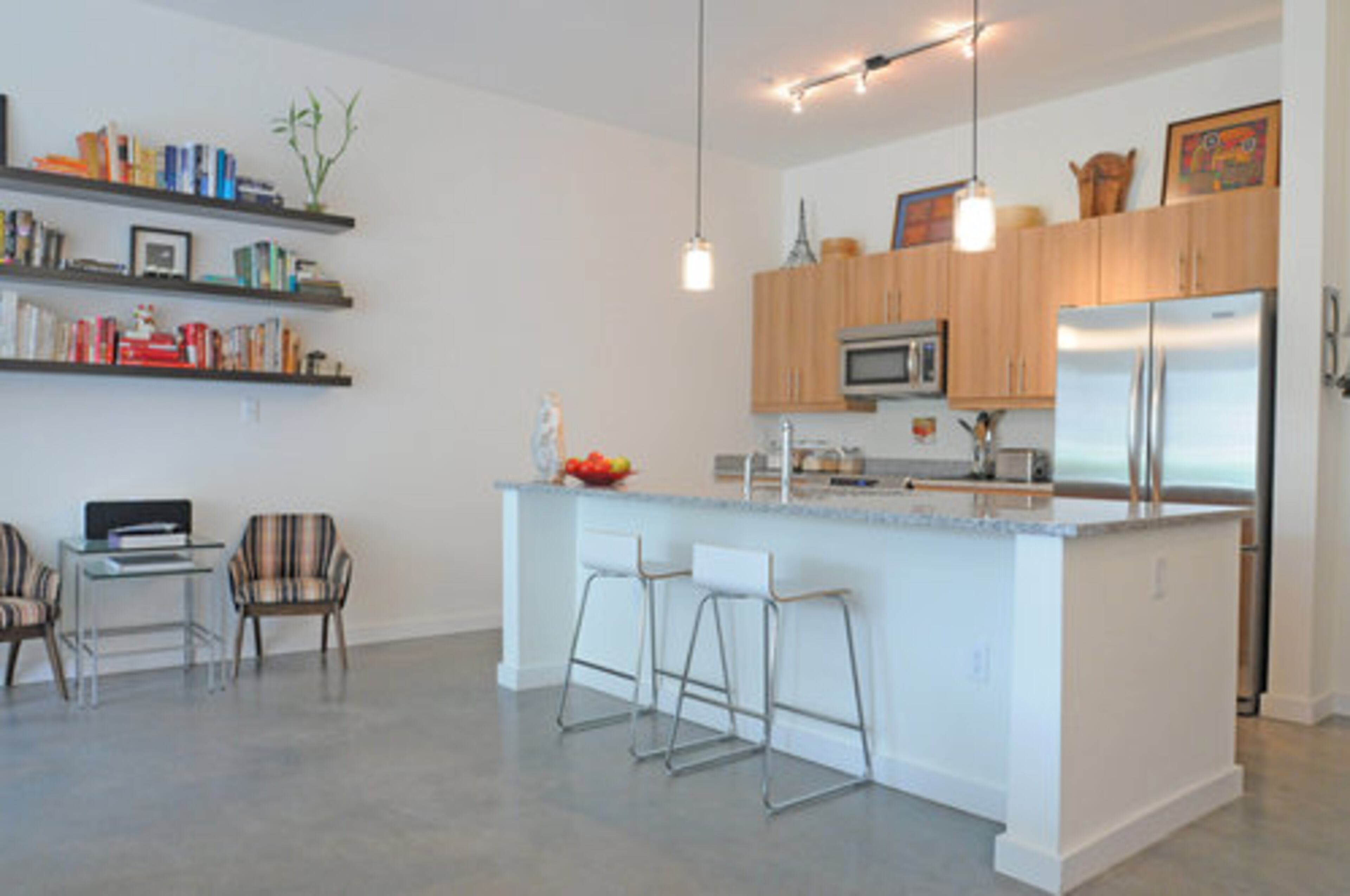 Krista and her sister Kelly will soon be opening Two Sisters Market, a grocery store and delicatessen, as part of the retail offerings at Castleberry Point. She thinks the building is in a great spot to take advantage of foot traffic from the downtown federal and state office buildings, and sees the growing retail potential of the Castleberry Hill neighborhood. So far a wine store has opened, and a salon, clothing store, barber shop and art gallery are all in the works.