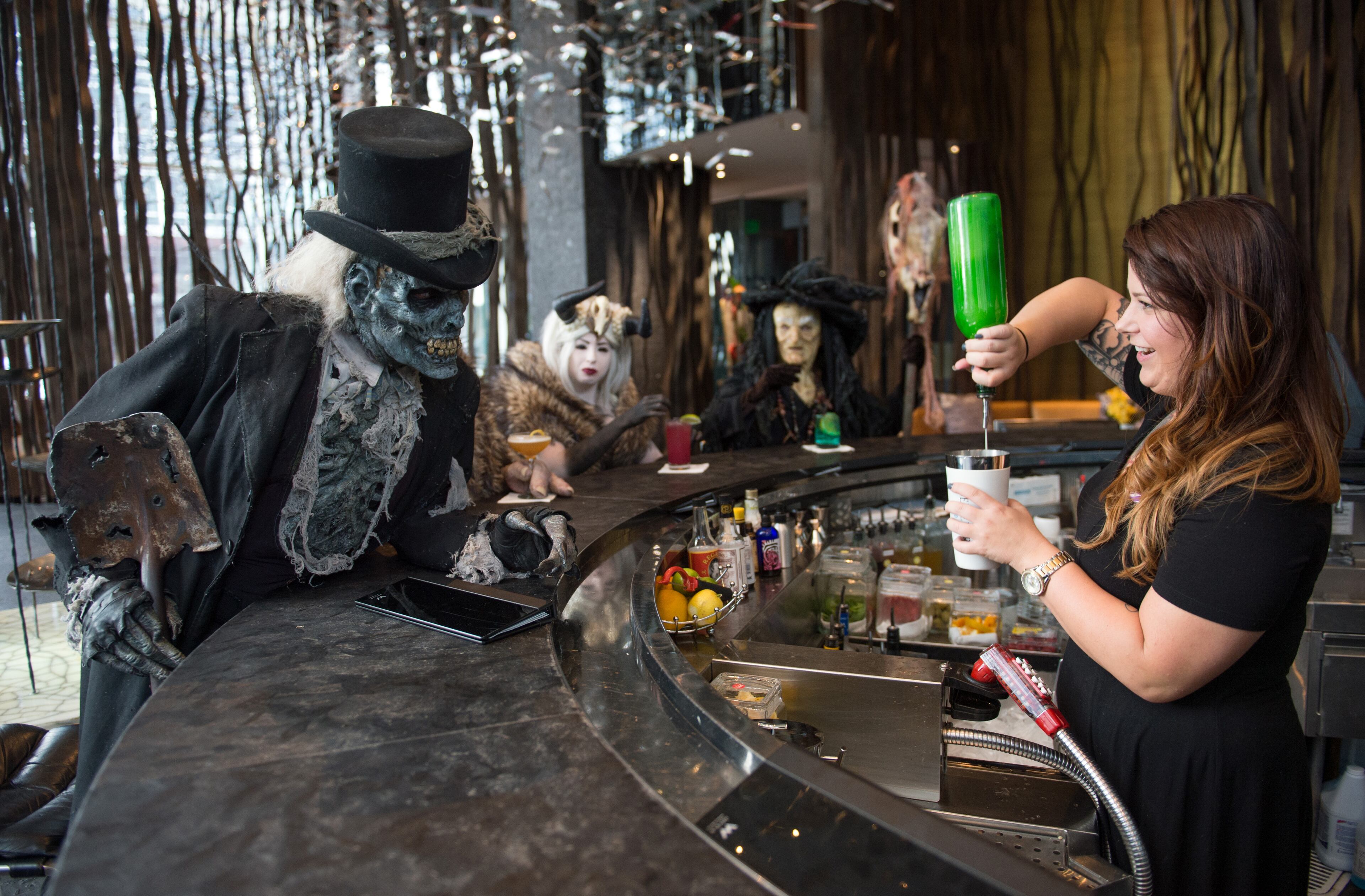 Monsters from Netherworld Haunted House in Norcross (from left) The Collector, Crampus and the Crampus Queen hang out at Living Room at W Atlanta Downtown hotel on Thursday, October 7, 2014. HYOSUB SHIN / HSHIN@AJC.COM