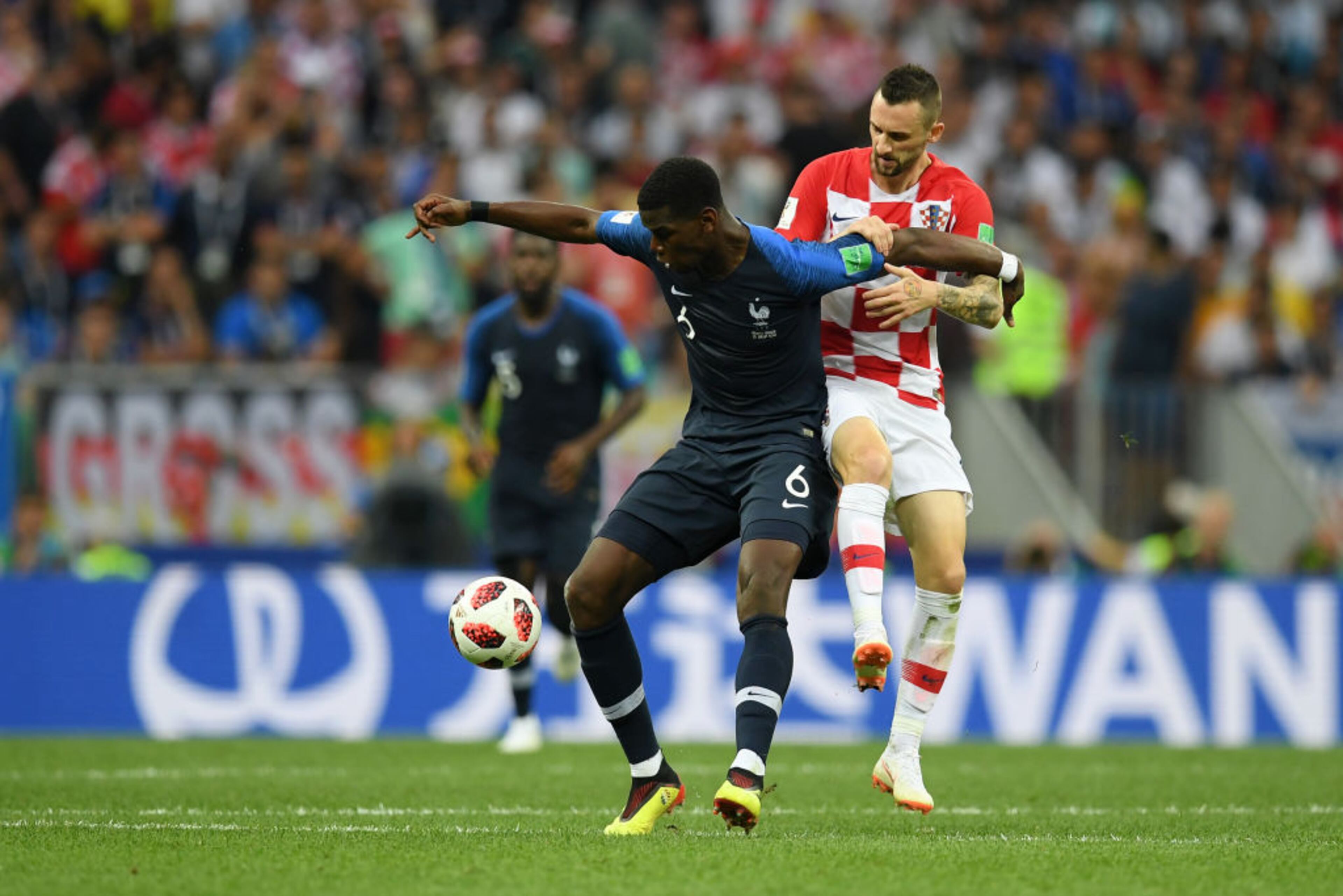 MOSCOW, RUSSIA - JULY 15: Paul Pogba of France is challenged by Marcelo Brozovic of Croatia during the 2018 FIFA World Cup Final between France and Croatia at Luzhniki Stadium on July 15, 2018 in Moscow, Russia. (Photo by Matthias Hangst/Getty Images)