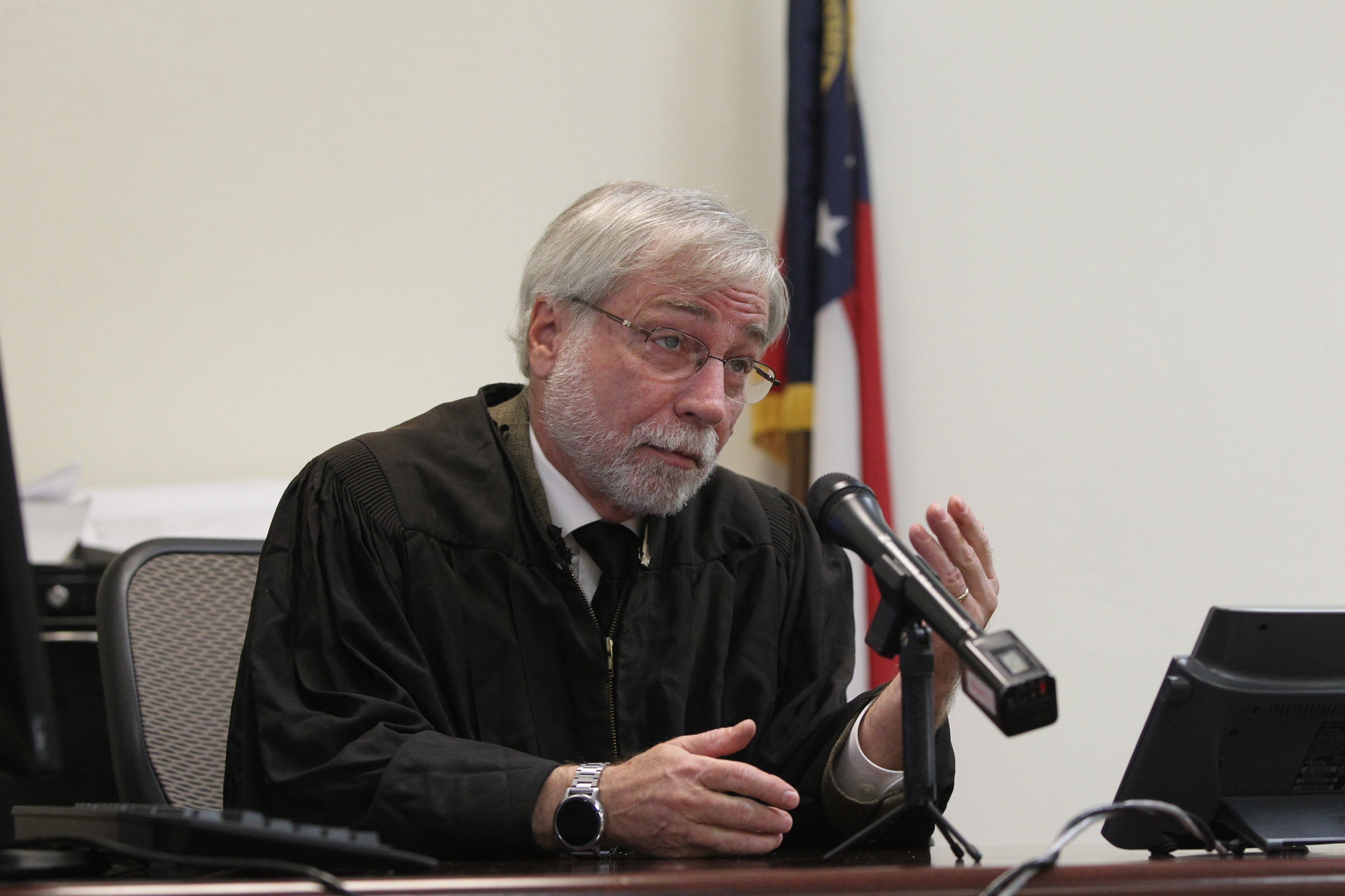 April 1, 2017, Atlanta, Georgia - Judge James Altman beckons for Basil Eleby, the man charged with setting the fire underneath I-85 NB on Thursday night, to come out to hear his charges at the Fulton County Jail in Atlanta, Georgia, on April 1, 2017. Eleby received two charges of $100,000 each amounting to total bail of $200,000 for Criminal Damage 1st Degree and Arson 1st Degree after setting a fire underneath a bridge on I-85 NB that would eventually cause a section of the bridge on I-85 to be closed off indefinitely. (HENRY TAYLOR / HENRY.TAYLOR@AJC.COM)