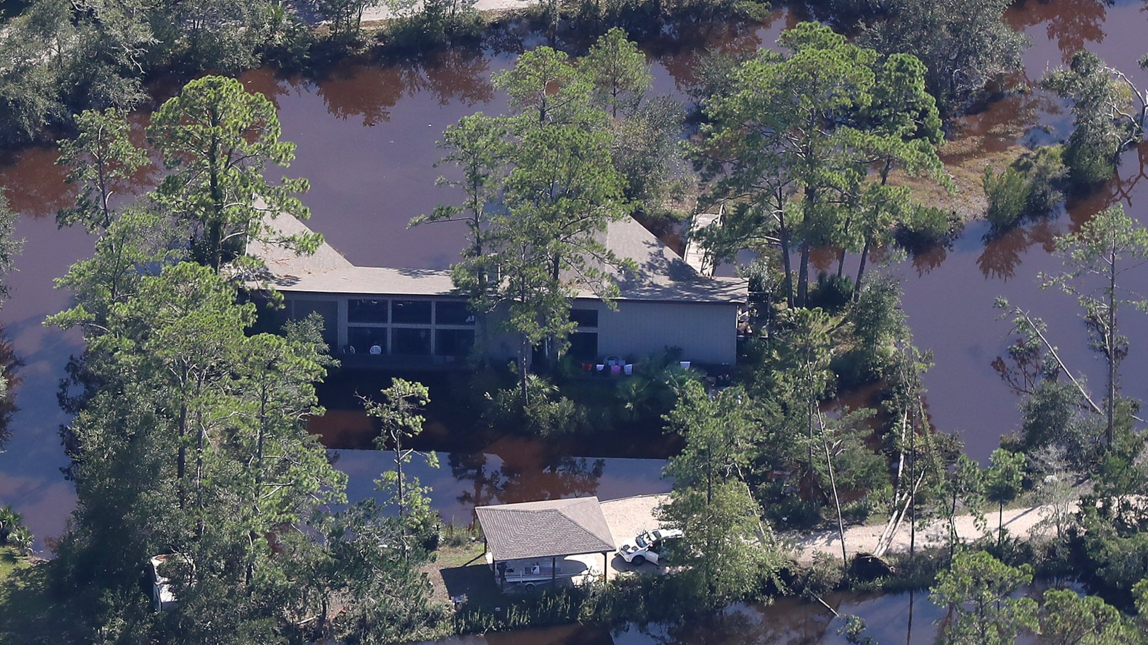 September 12, 2017 St. Simons Island: A home on St. Simons Island is surrounded by water following Hurricane Irma on Tuesday, September 12, 2017, on the Georgia coast. Curtis Compton/ccompton@ajc.com