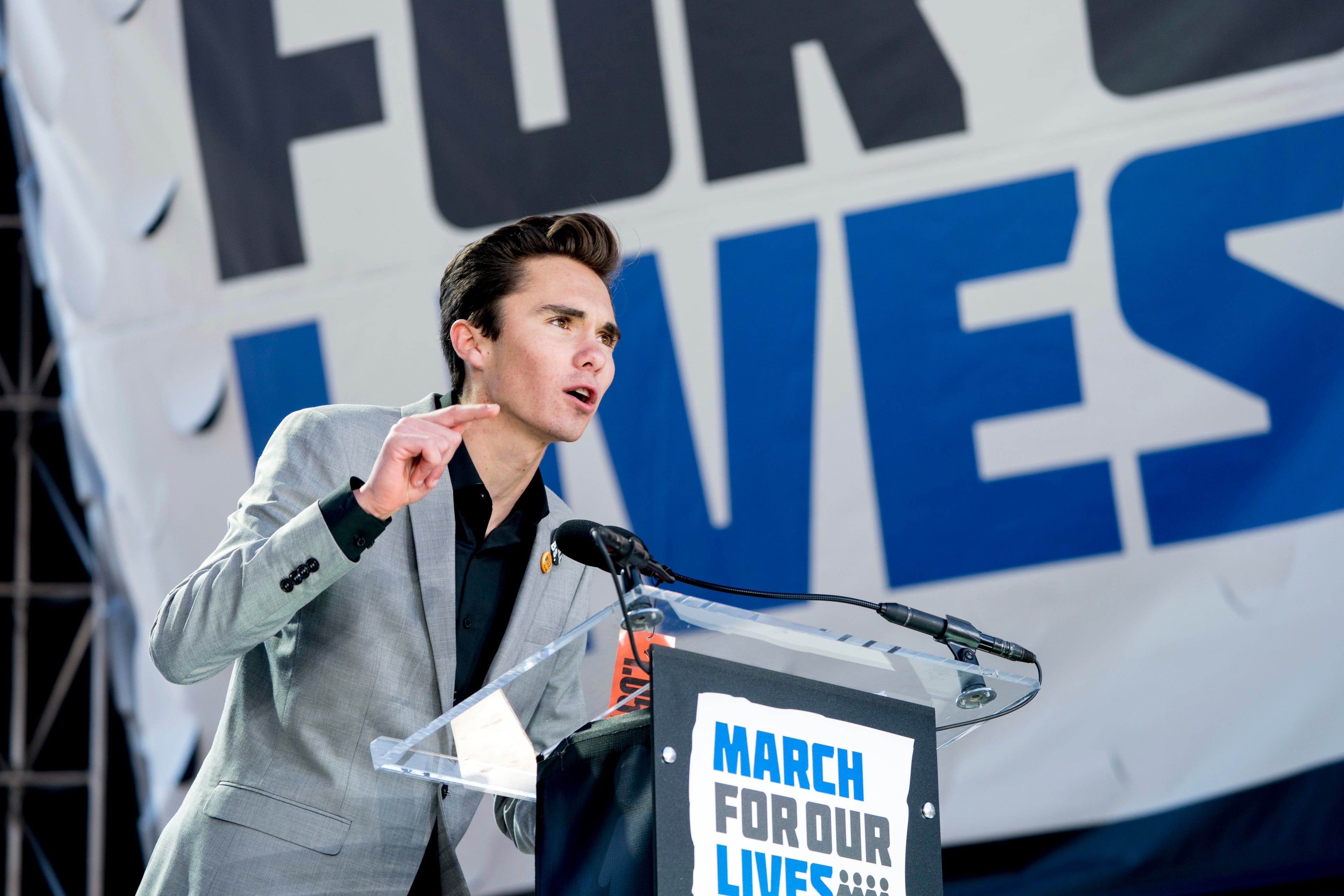 David Hogg, a survivor of the mass shooting at Marjory Stoneman Douglas High School in Parkland, Fla., speaks during the "March for Our Lives" rally in support of gun control in Washington, Saturday, March 24, 2018. (AP Photo/Andrew Harnik)
