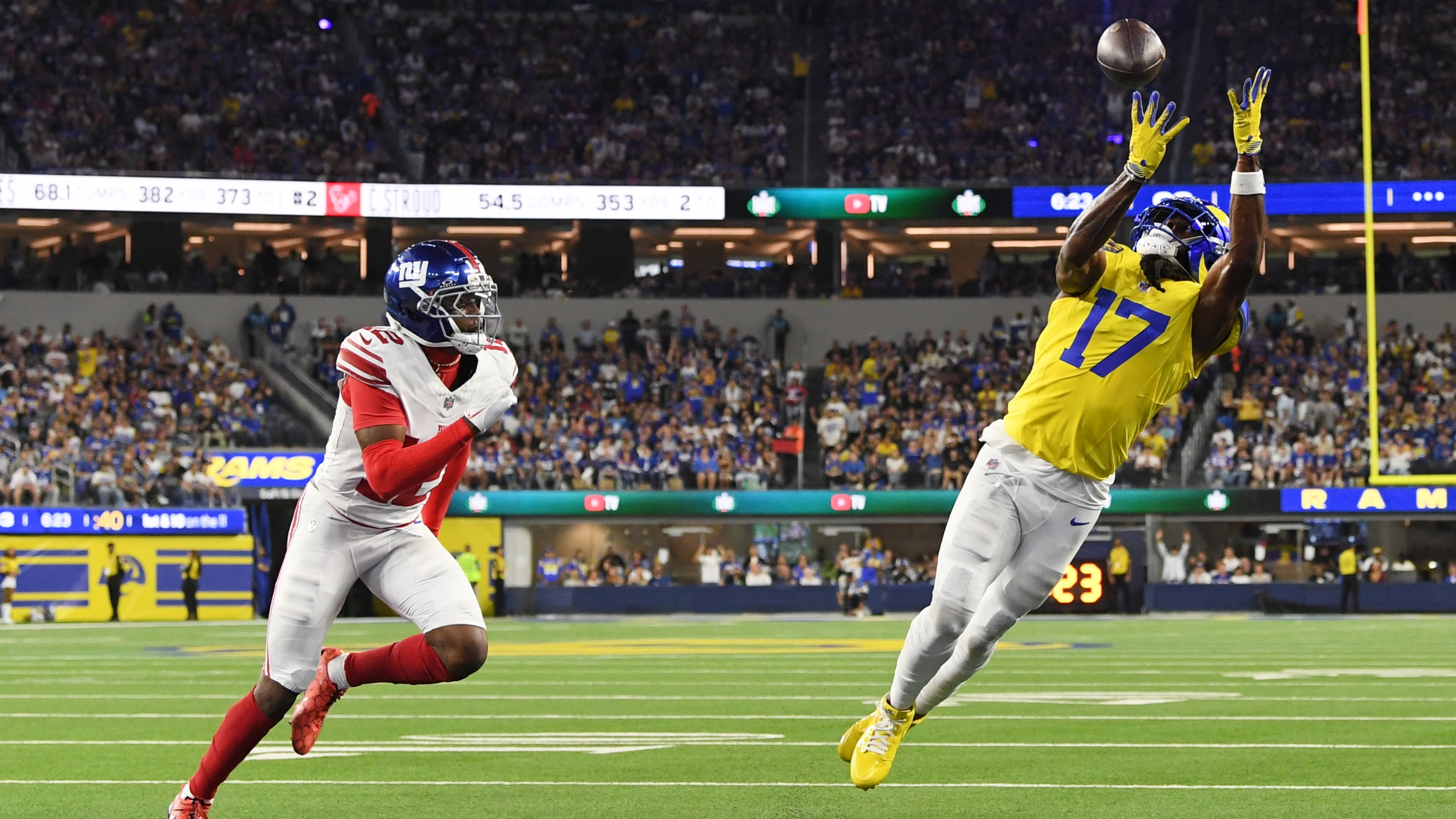 Los Angeles Rams wide receiver Davante Adams (17) makes a touchdown catch past New York Giants cornerback Colton Hood (12) during the second half of an NFL football game in Inglewood, Calif., Monday, Sept. 21, 2026. (AP Photo/Katie Chin)