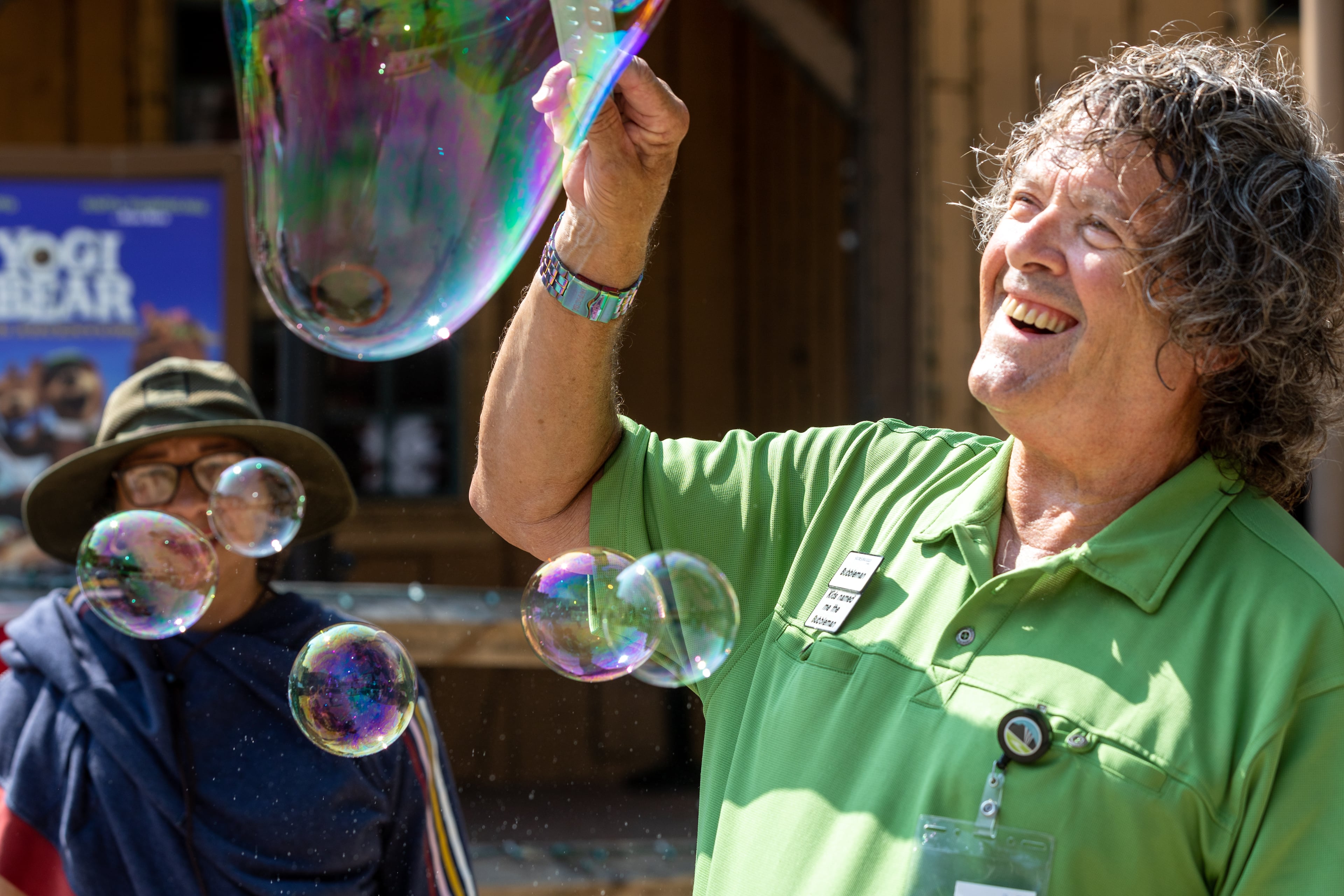 Robin Booth's love of bubbles started when he was gifted a bubble wand at the Yellow Daisy Festival decades ago. (Arvin Temkar / arvin.temkar@ajc.com)