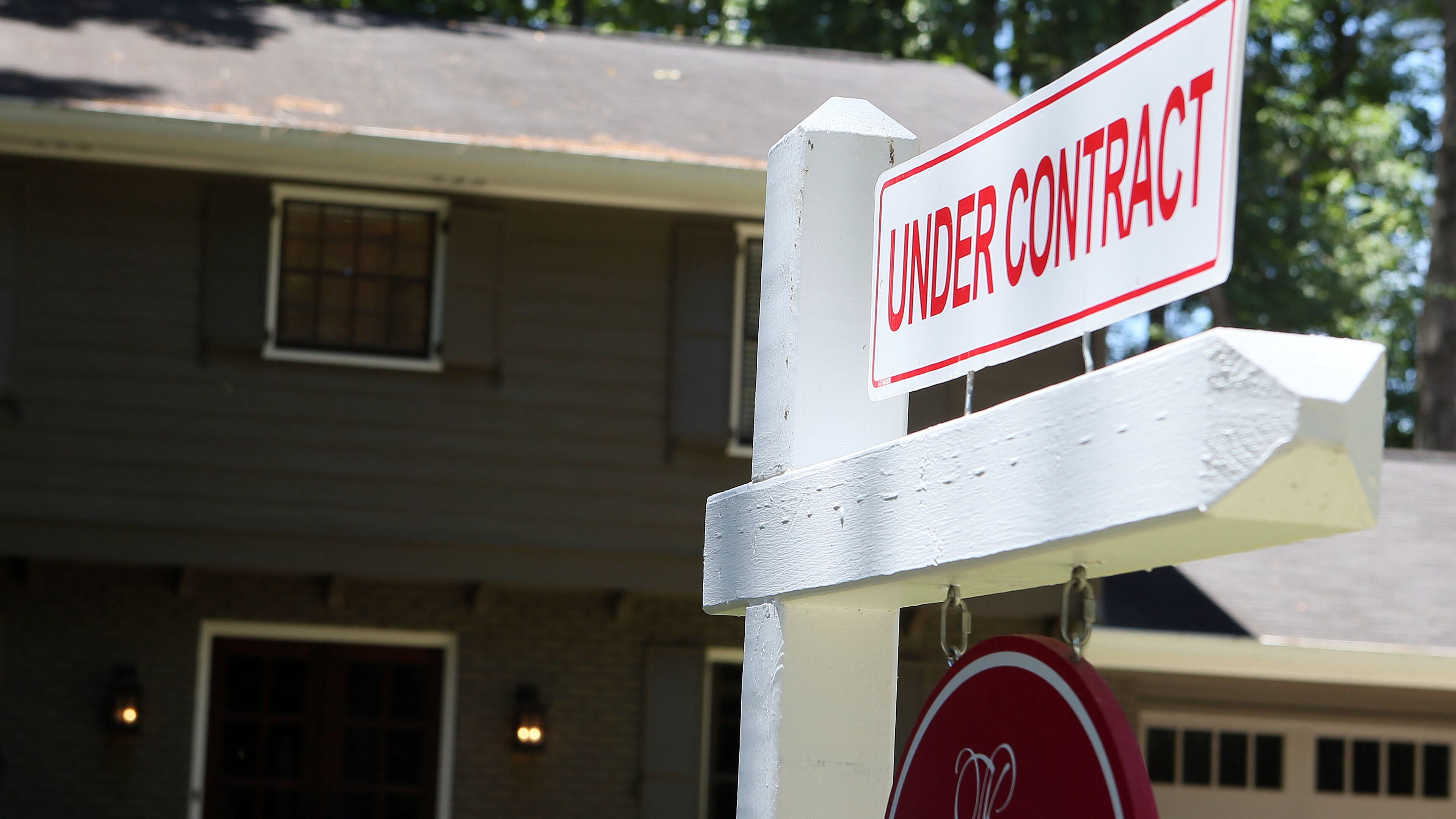 A Dunwoody home with an under contract sign in front on Tuesday, May 28th, 2013.