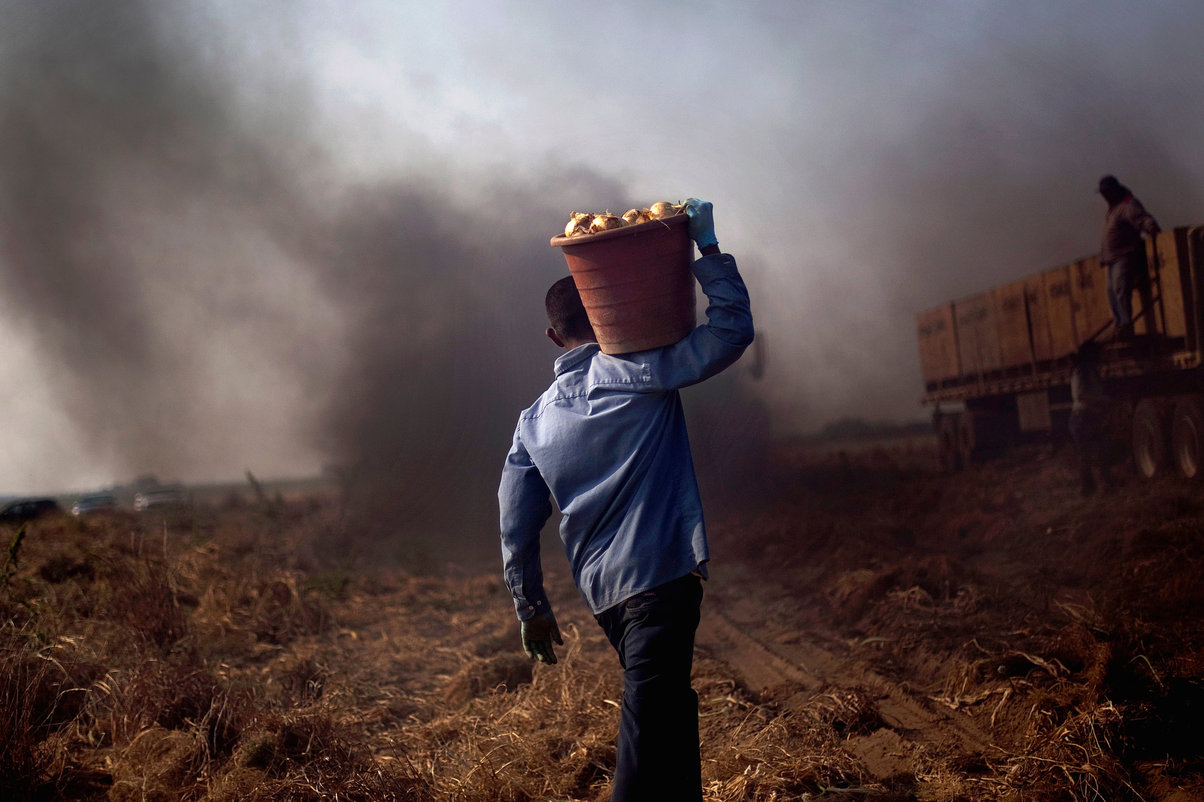 An indictment unsealed this week describes a conspiracy to exploit migrant farmworkers in Georgia. (David Goldman/AP)