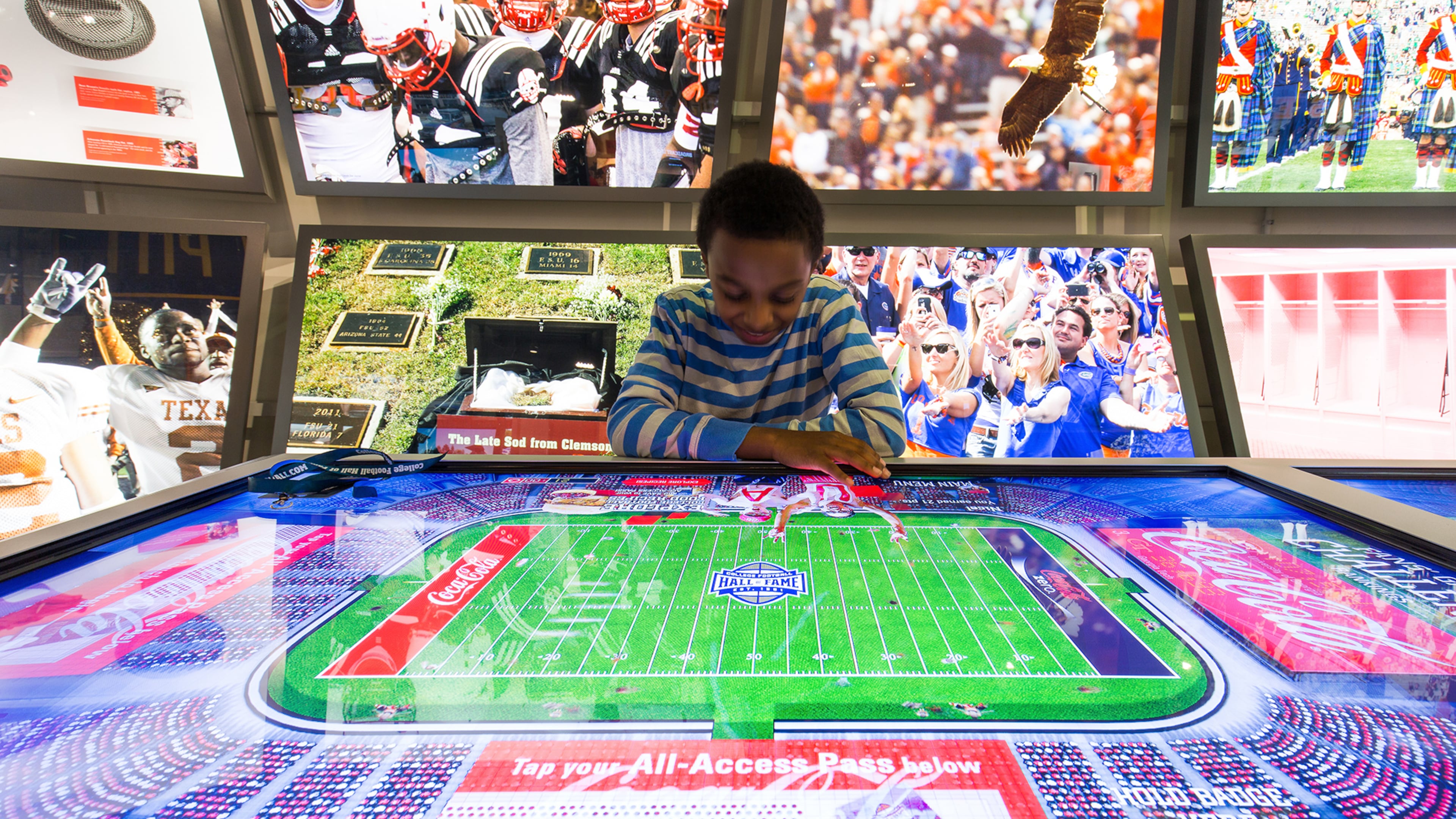 A youngster studies strategy at the College Football Hall of Fame.
(Courtesy of the College Football Hall of Fame)