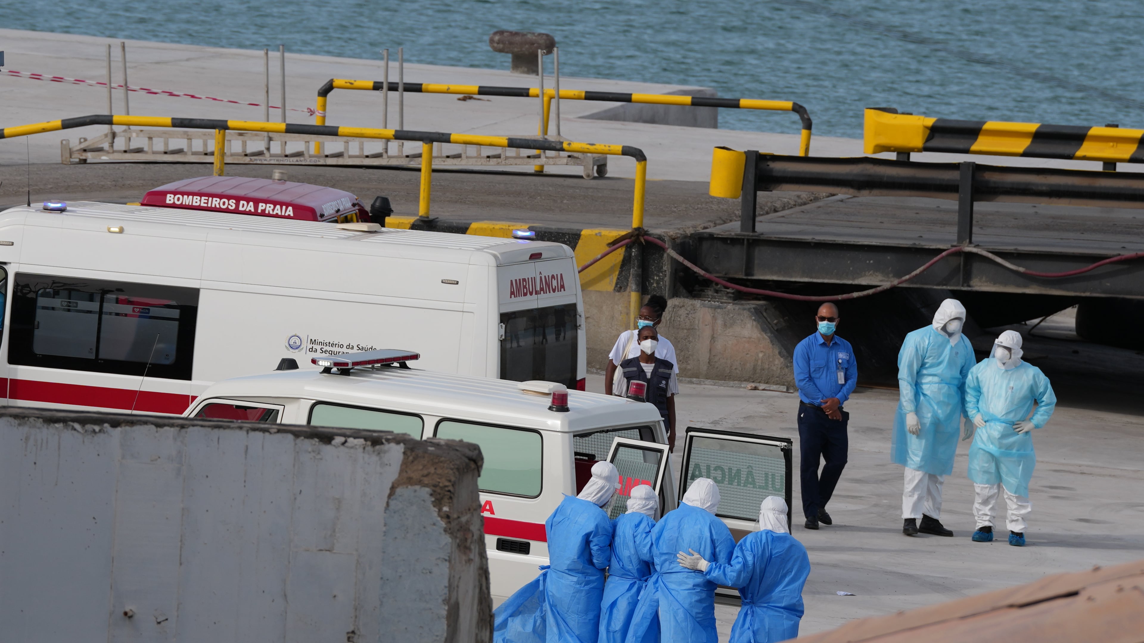 Health workers in protective gear evacuate patients from the MV Hondius cruise ship at a port in Praia, Cape Verde, Wednesday, May 6, 2026. (Misper Apawu/AP)