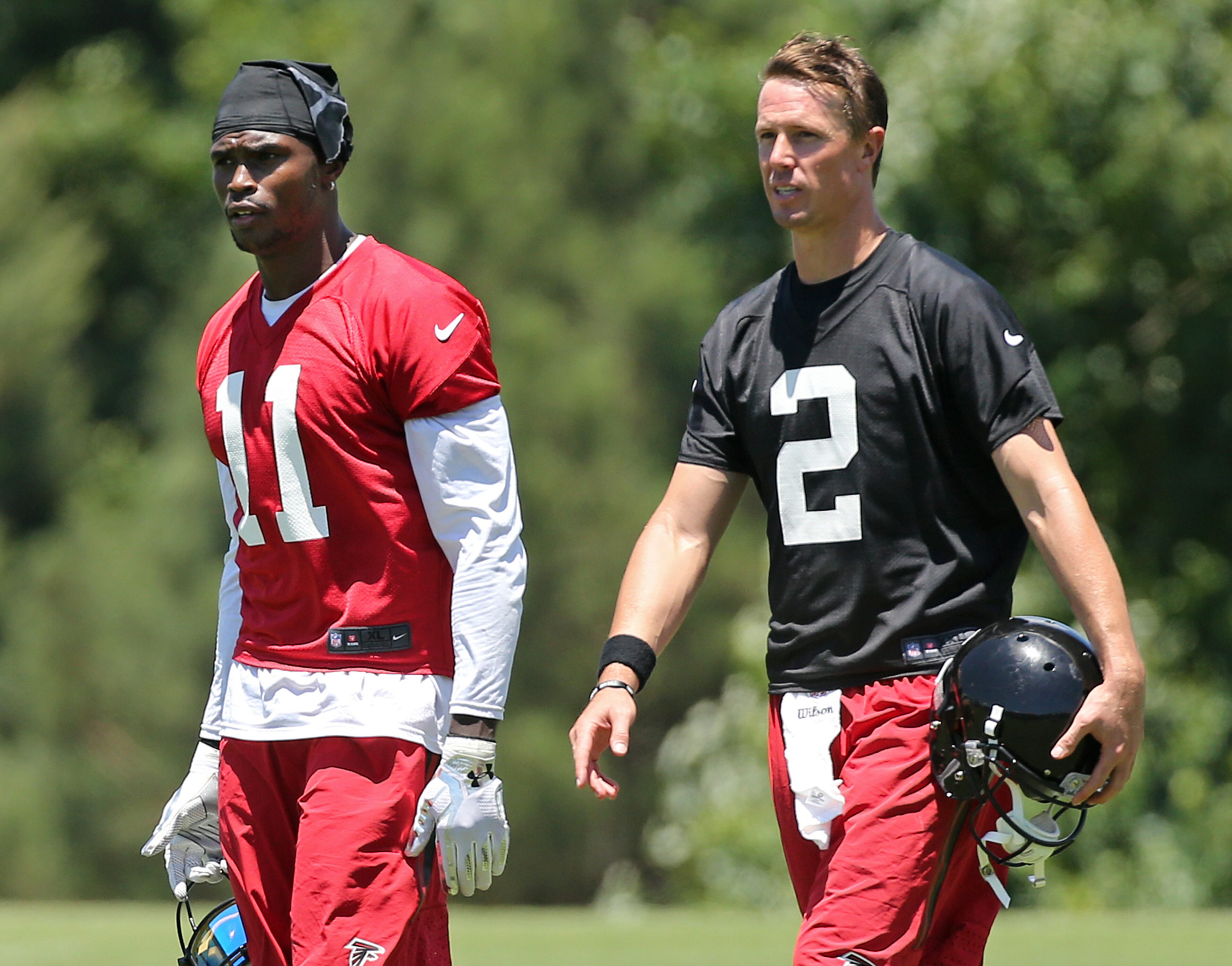 Falcons quarterback Matt Ryan and wide receiver Julio Jones during practice on an OTA day, Tuesday, June 7, 2016, in Flowery Branch. Curtis Compton / ccompton@ajc.com