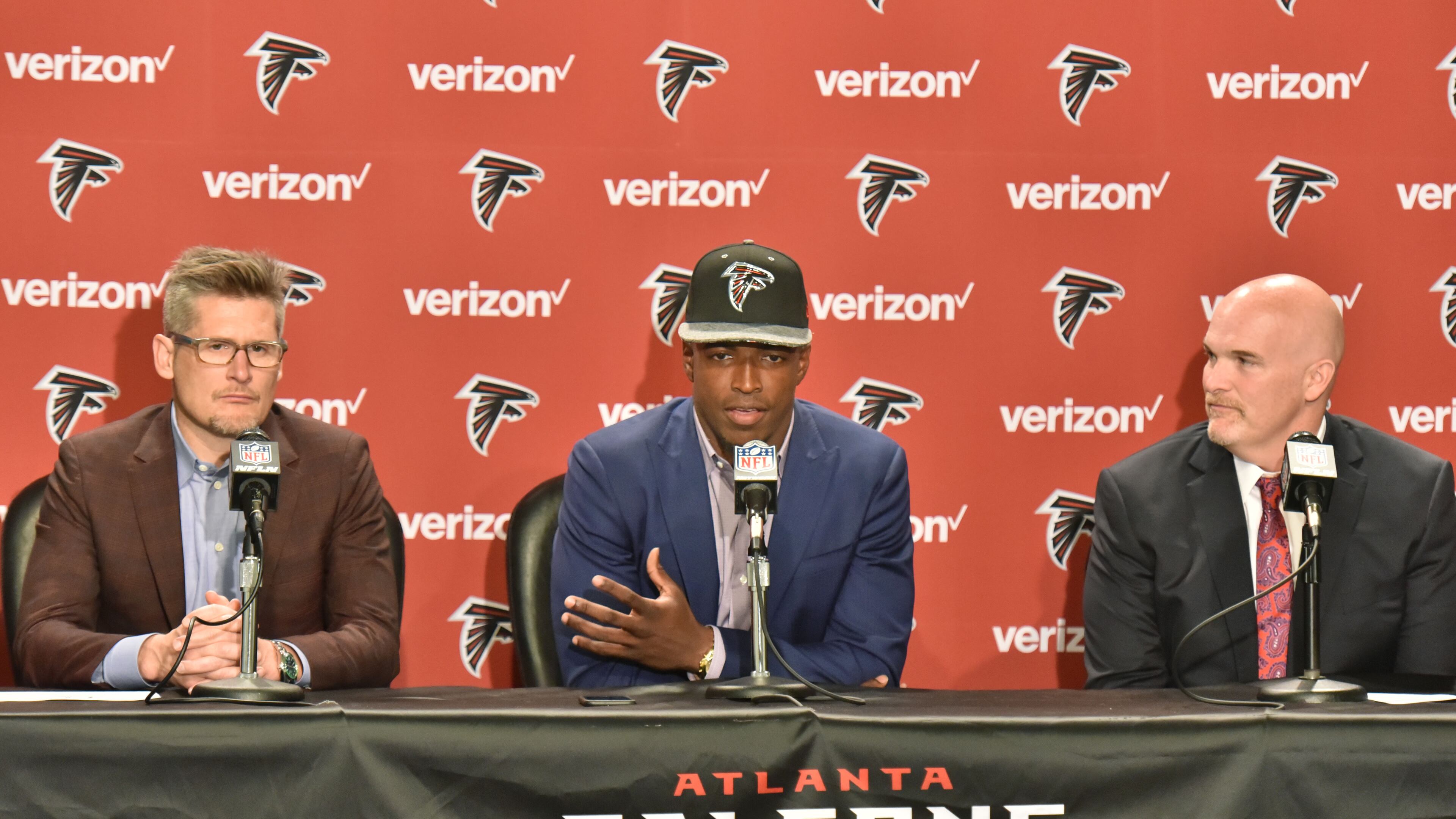 April 29, 2016 Flowery Branch - Falcons first-round pick Keanu Neal speaks as Falcons general manager Thomas Dimitroff (left) and coach Dan Quinn sit next him during a press conference at the Falcons' Flowery Branch Headquarters Complex on Friday, April 29, 2016. With the 17th pick in the 2016 NFL Draft, the Falcons selected defensive back Keanu Neal of Florida. HYOSUB SHIN / HSHIN@AJC.COM