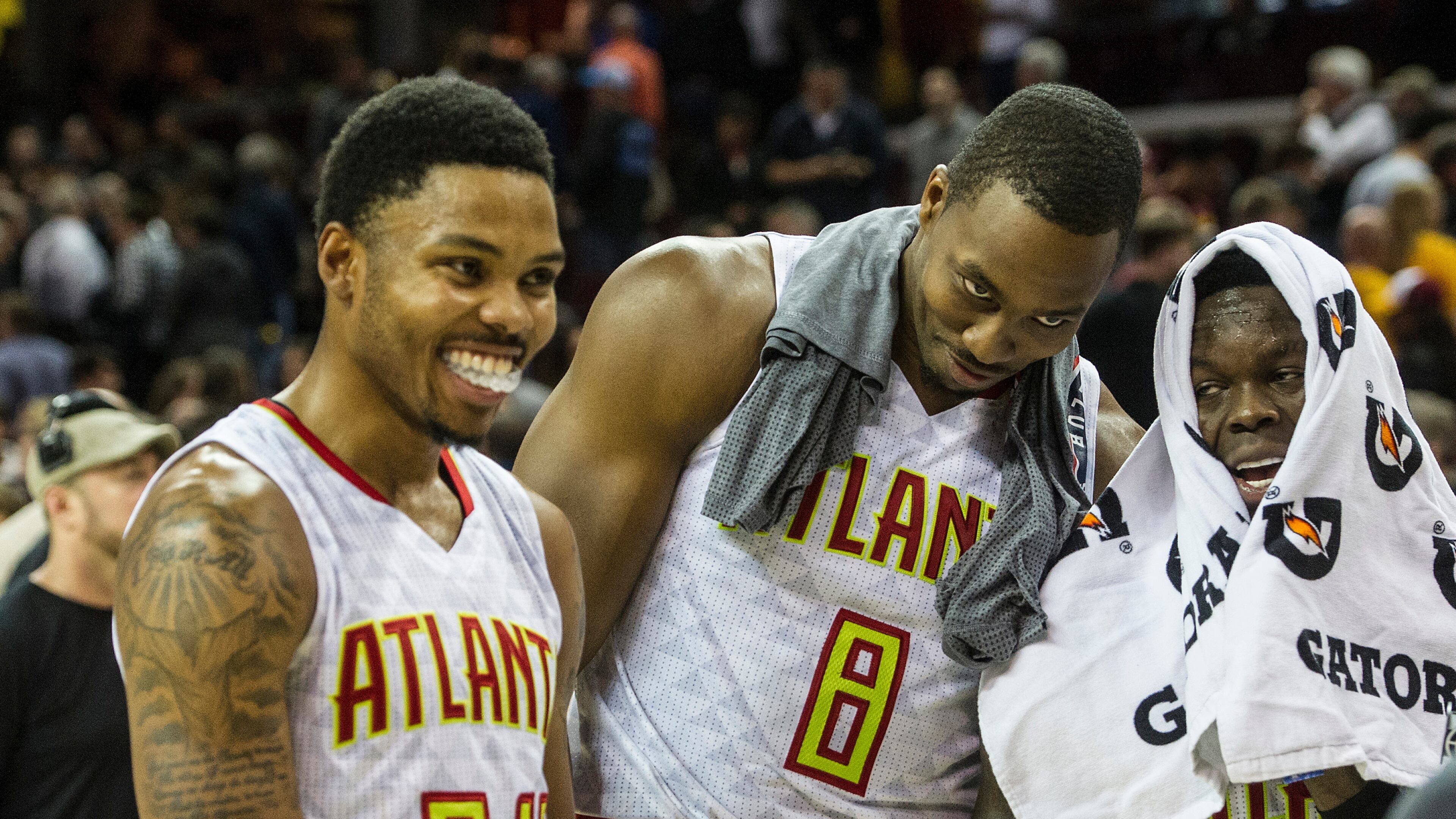 The Atlanta Hawks are all smiles after beating Cleveland last week. The team’s owner, meanwhile, is 3-0 against local governments. (AP Photo/Phil Long)